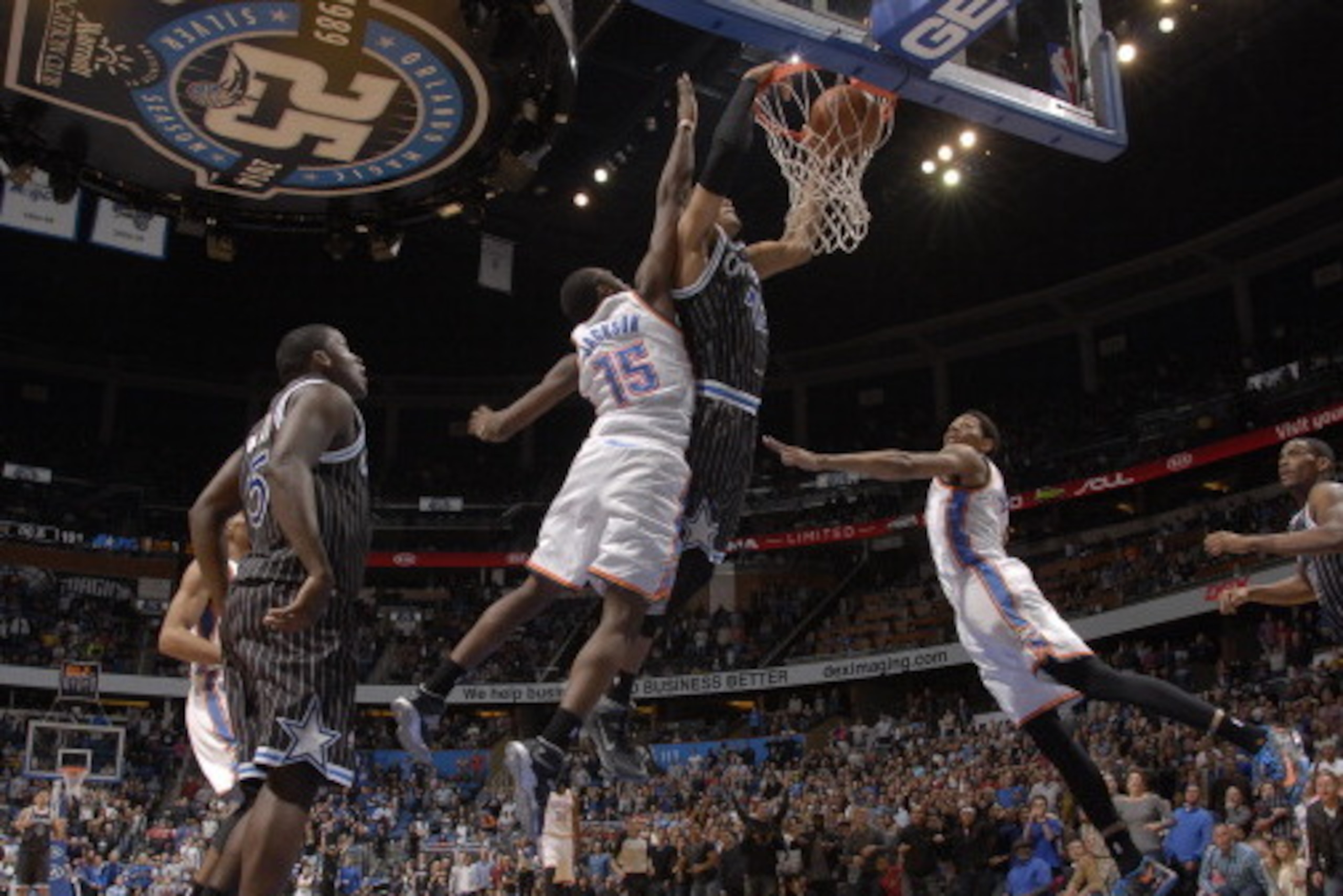 ORLANDO, FL - FEBRUARY 7: Tobias Harris #12 of the Orlando Magic dunks the ball for the game winner, against the Oklahoma City Thunder during the game on February 7, 2014 at Amway Center in Orlando, Florida. NOTE TO USER: User expressly acknowledges and a