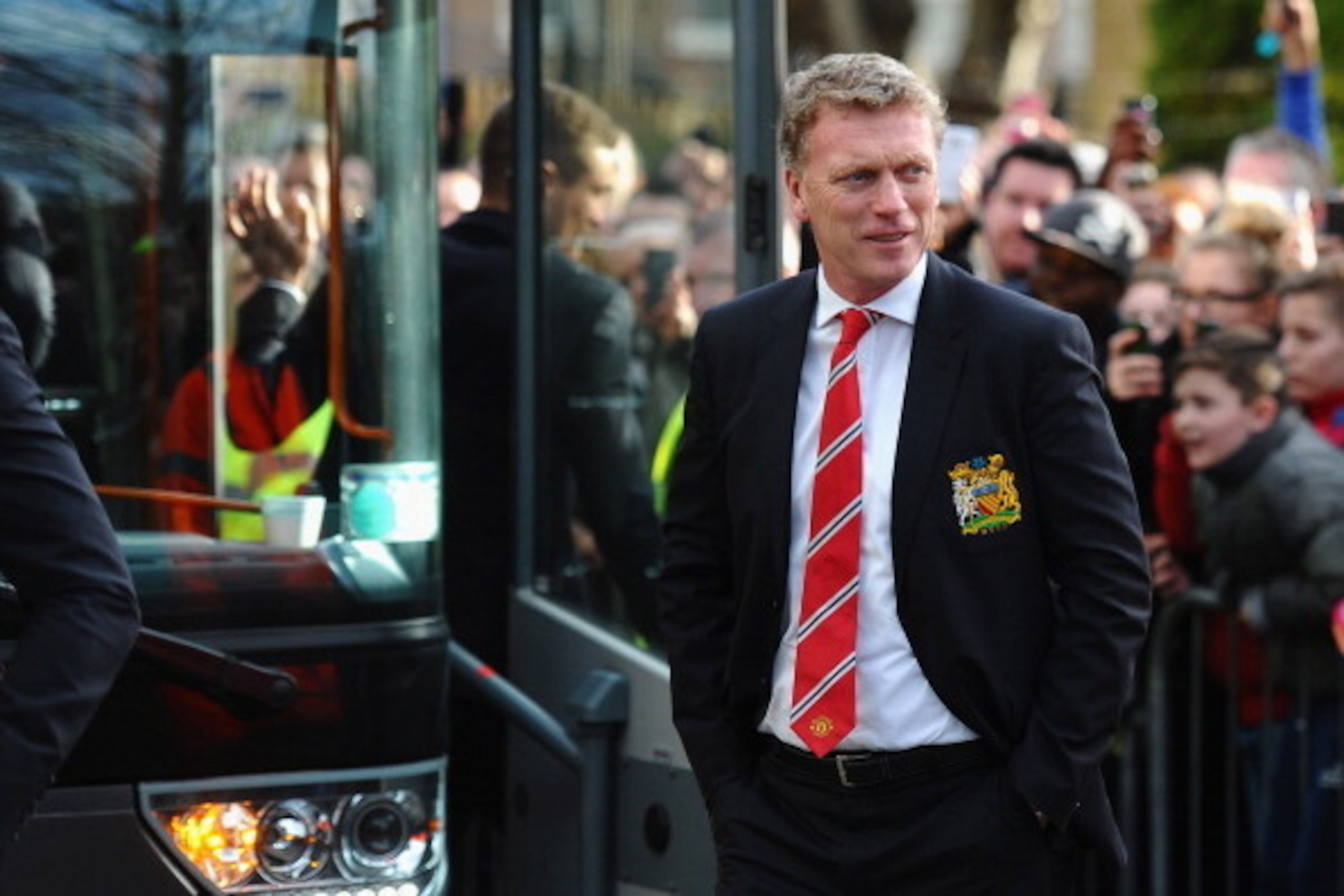 LONDON, ENGLAND - FEBRUARY 22: David Moyes of Manchester United steps off the team bus to a noisy welcome from the home supporters prior to the Barclays Premier League match between Crystal Palace and Manchester United at Selhurst Park on February 22, 201