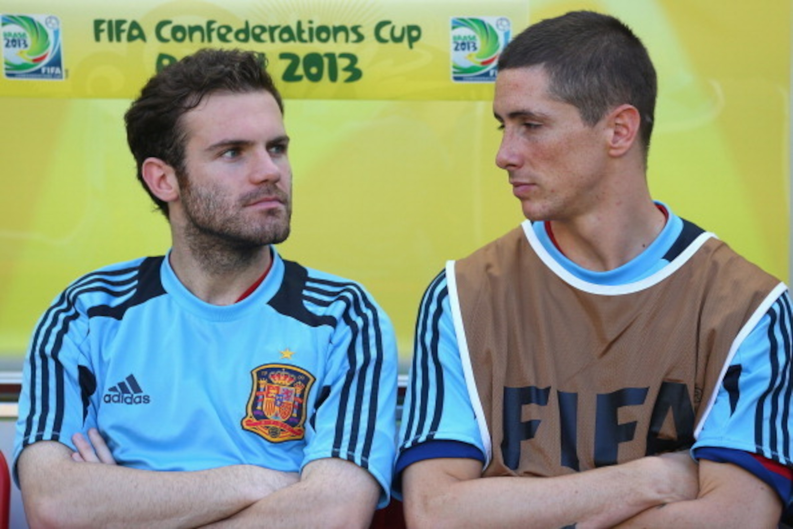 FORTALEZA, BRAZIL - JUNE 23:  Juan Mata and Fernando Torres of Spain look on prior to the FIFA Confederations Cup Brazil 2013 Group B match between Nigeria and Spain at Castelao on June 23, 2013 in Fortaleza, Brazil.  (Photo by Clive Rose/Getty Images)