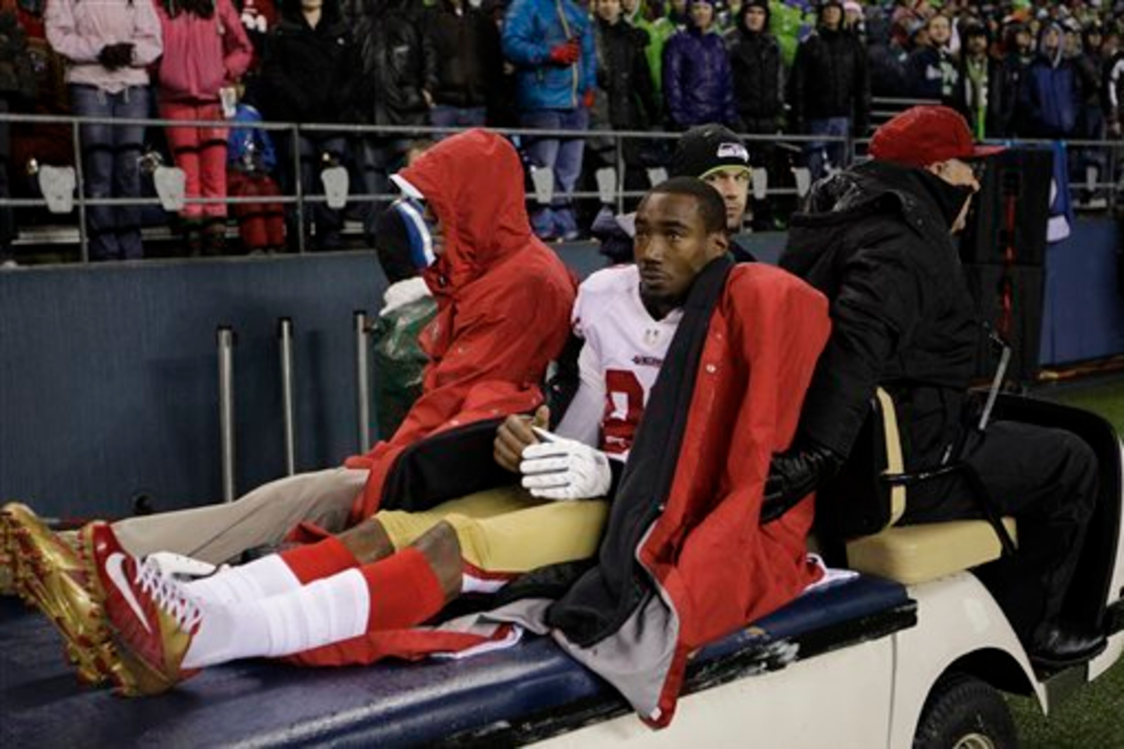 Familiar sight much? Mario Manningham is carted off following his knee injury suffered in 2012.