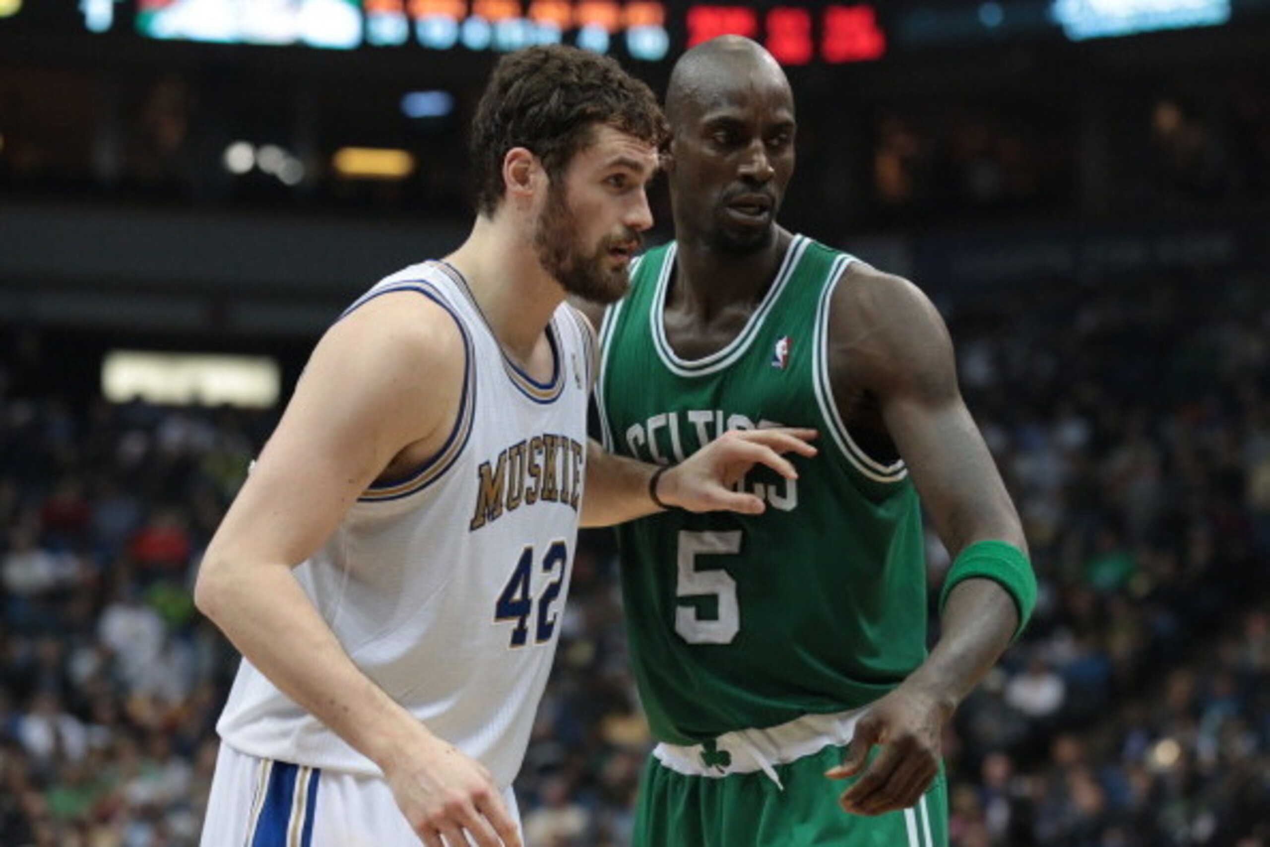 MINNEAPOLIS, MN - MARCH 30:  Kevin Love #42 of the Minnesota Timberwolves boxes out Kevin Garnett #5 of the Boston Celtics as they watch the action during the game on March 30, 2012 at Target Center in Minneapolis, Minnesota. NOTE TO USER: User expressly 