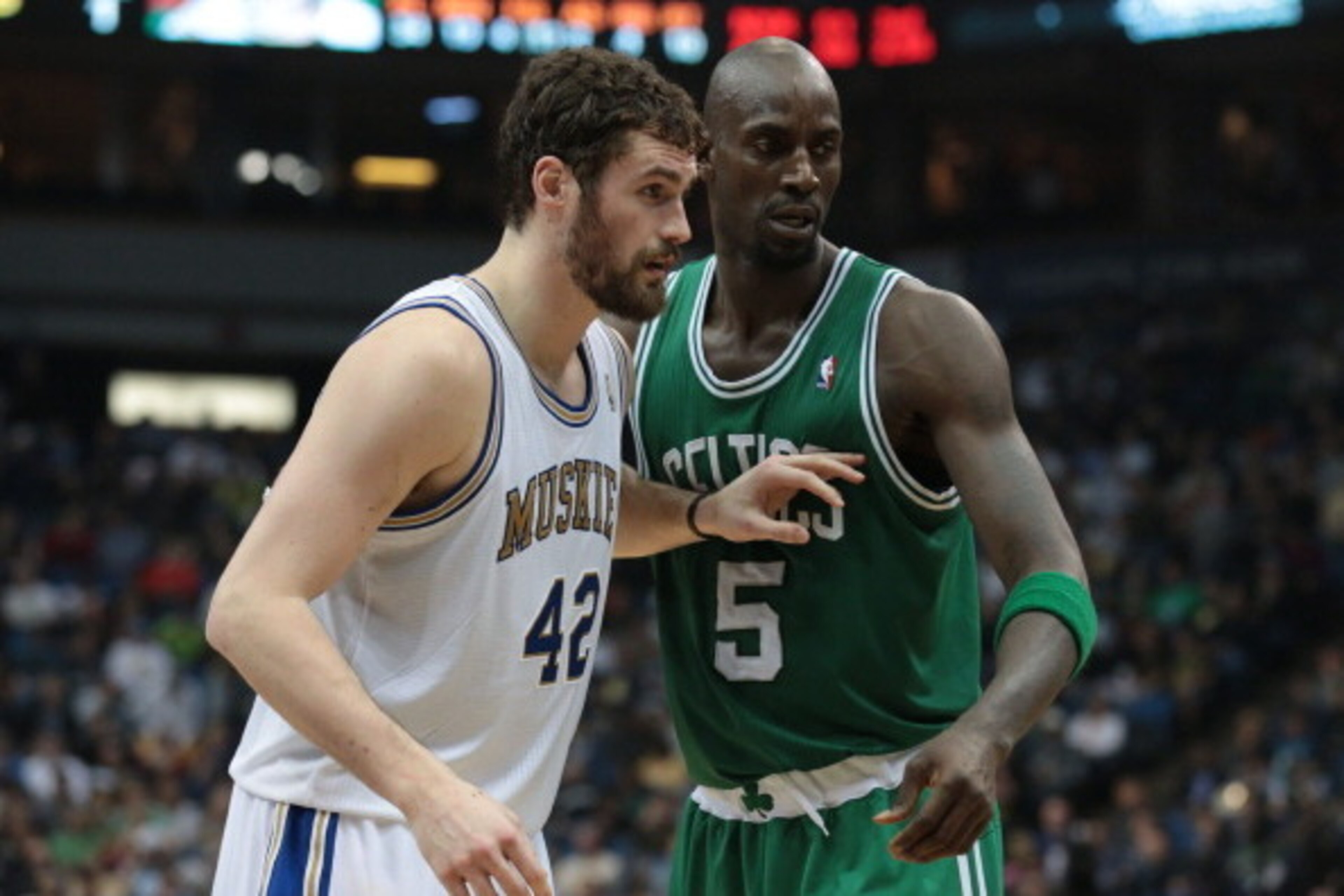MINNEAPOLIS, MN - MARCH 30: Kevin Love #42 of the Minnesota Timberwolves boxes out Kevin Garnett #5 of the Boston Celtics as they watch the action during the game on March 30, 2012 at Target Center in Minneapolis, Minnesota. NOTE TO USER: User expressly MINNEAPOLIS, MN - MARCH 30: Kevin Love #42 of the Minnesota Timberwolves boxes out Kevin Garnett #5 of the Boston Celtics as they watch the action during the game on March 30, 2012 at Target Center in Minneapolis, Minnesota. NOTE TO USER: User expressly
