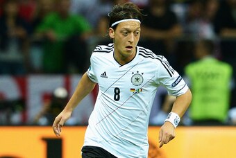 WARSAW, POLAND - JUNE 28:   Mesut Ozil of Germany in action during the UEFA EURO 2012 semi final match between Germany and Italy at the National Stadium on June 28, 2012 in Warsaw, Poland.  (Photo by Claudio Villa/Getty Images)