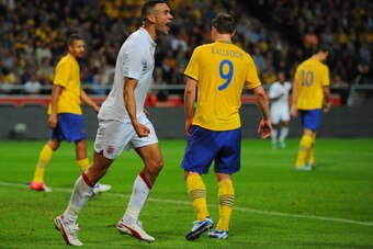STOCKHOLM, SWEDEN - NOVEMBER 14:  Steven Caulker of England celebrates scoring to make it 2-1 during the international friendly match between Sweden and England at the Friends Arena on November 14, 2012 in Stockholm, Sweden.  (Photo by Michael Regan/Getty