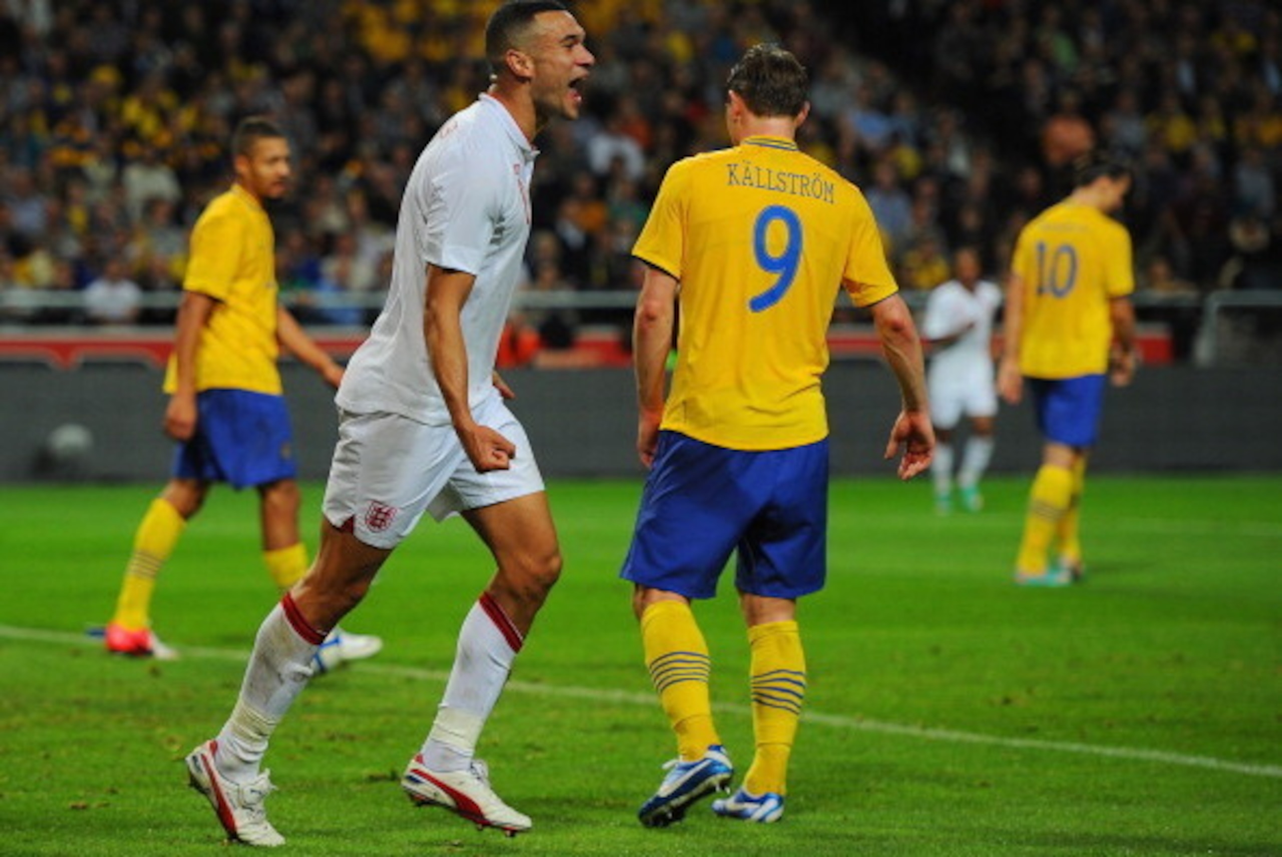 STOCKHOLM, SWEDEN - NOVEMBER 14:  Steven Caulker of England celebrates scoring to make it 2-1 during the international friendly match between Sweden and England at the Friends Arena on November 14, 2012 in Stockholm, Sweden.  (Photo by Michael Regan/Getty