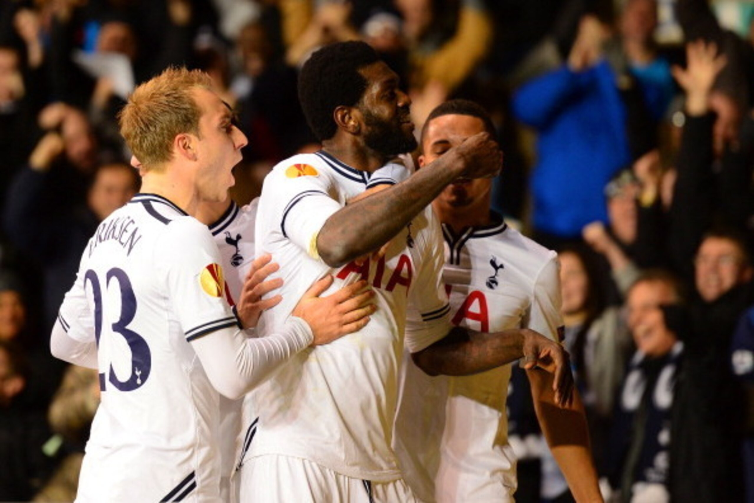 LONDON, ENGLAND - FEBRUARY 27:  Emmanuel Adebayor of Tottenham Hotspur celebrates  with Christian Eriksen of Tottenham Hotspur after scoring a goal during the UEFA Europa League Round of 32 second leg match between Tottenham Hotspur and  FC Dnipro Dniprop