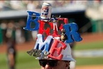 Mar 6, 2012; Mesa, AZ, USA; A vendor selling beer as the Chicago Cubs play against the Colorado Rockies at HoHoKam Park. Mandatory Credit: Allan Henry-USA TODAY Sports