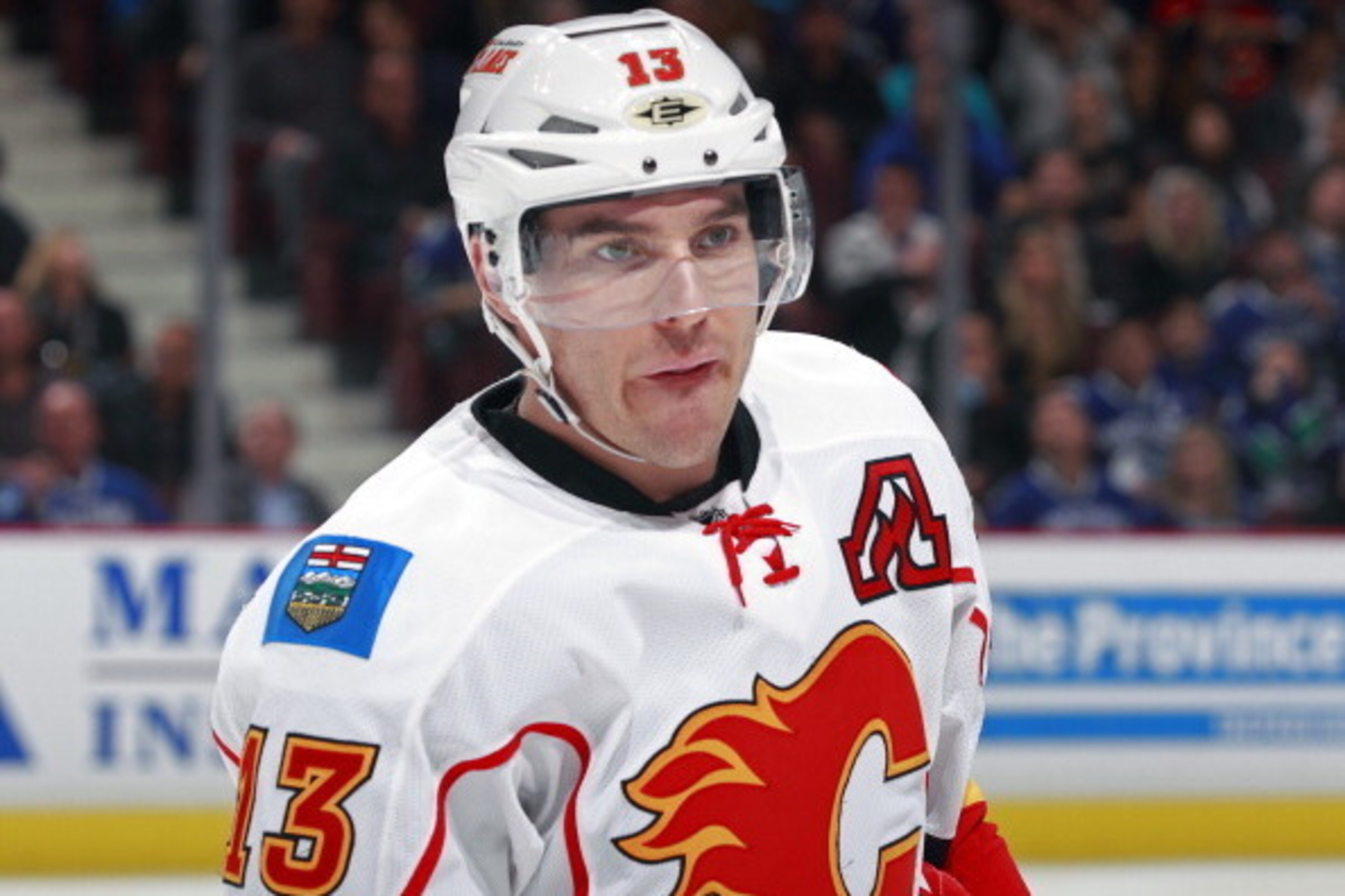 VANCOUVER, CANADA - APRIL 6: Mike Cammalleri #13 of the Calgary Flames skates to the bench during their NHL game against the Vancouver Canucks at Rogers Arena on April 6, 2013 in Vancouver, British Columbia, Canada. (Photo by Jeff Vinnick/NHLI via Getty I VANCOUVER, CANADA - APRIL 6: Mike Cammalleri #13 of the Calgary Flames skates to the bench during their NHL game against the Vancouver Canucks at Rogers Arena on April 6, 2013 in Vancouver, British Columbia, Canada. (Photo by Jeff Vinnick/NHLI via Getty I