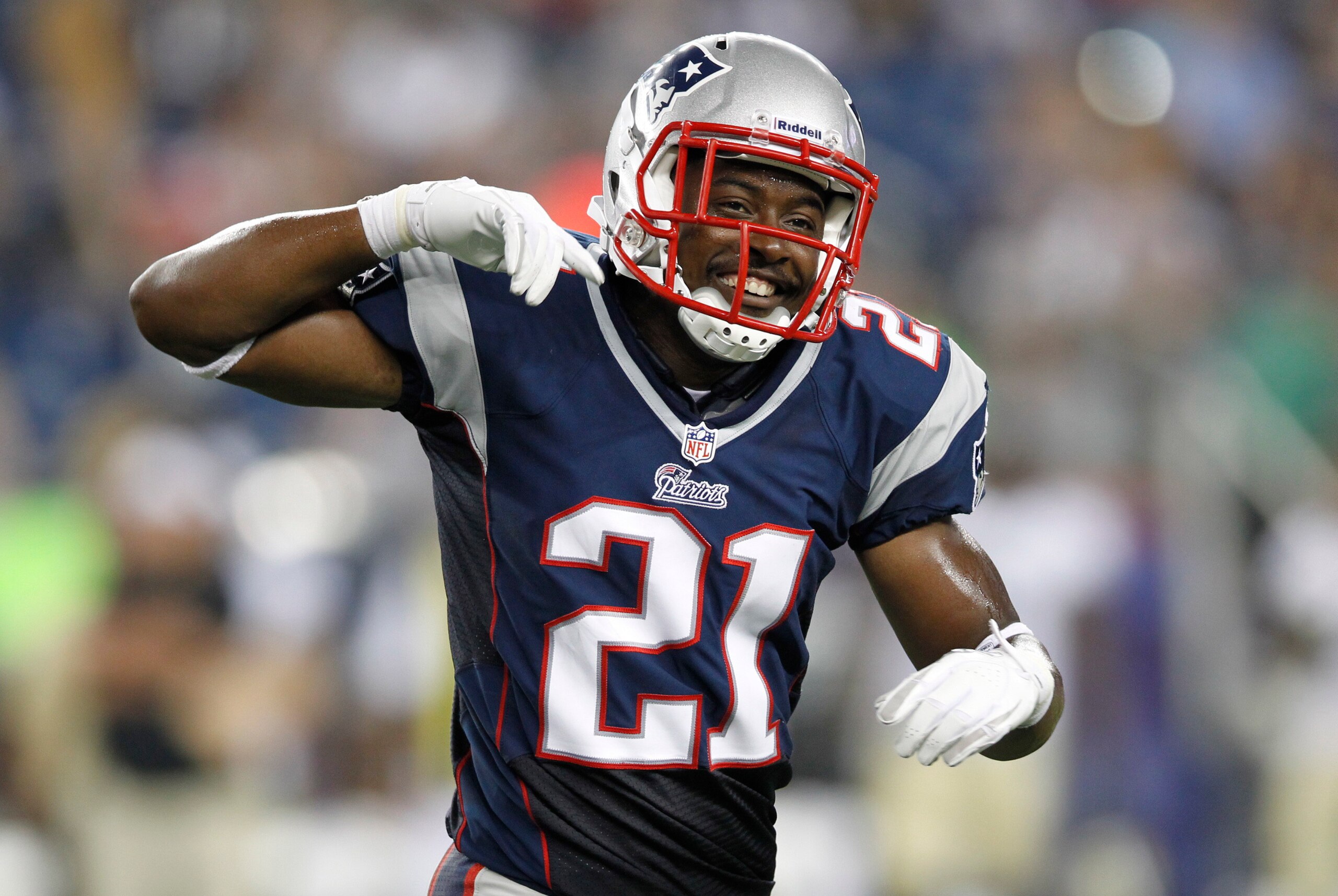 Aug 9, 2012; Foxboro, Massachusetts, USA; New England Patriots defensive back Ras-I Dowling (21) celebrates after a failed field goal by the New Orleans Saints during the fourth quarter at Gillette Stadium.  The Patriots won 7-6.  Mandatory Credit: Greg M
