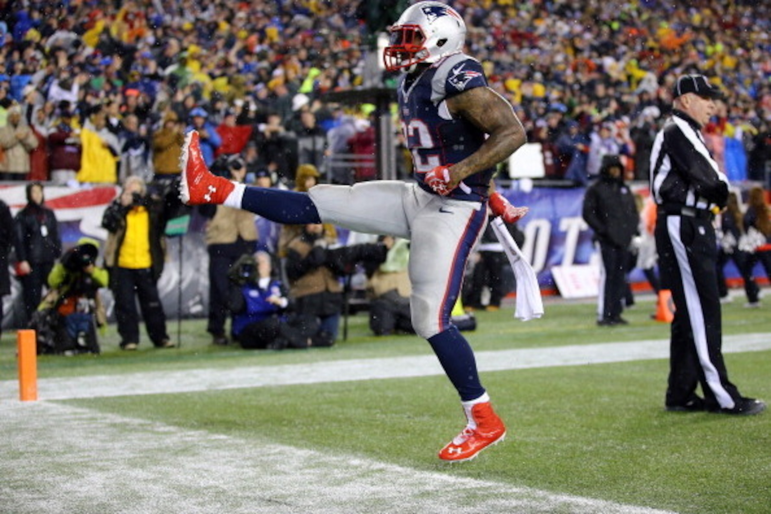 FOXBORO, MA - JANUARY 11:  Stevan Ridley #22 of the New England Patriots celebrates after scoring a 3 yard touchdown in the third quarter against the Indianapolis Colts during the AFC Divisional Playoff game at Gillette Stadium on January 11, 2014 in Foxb
