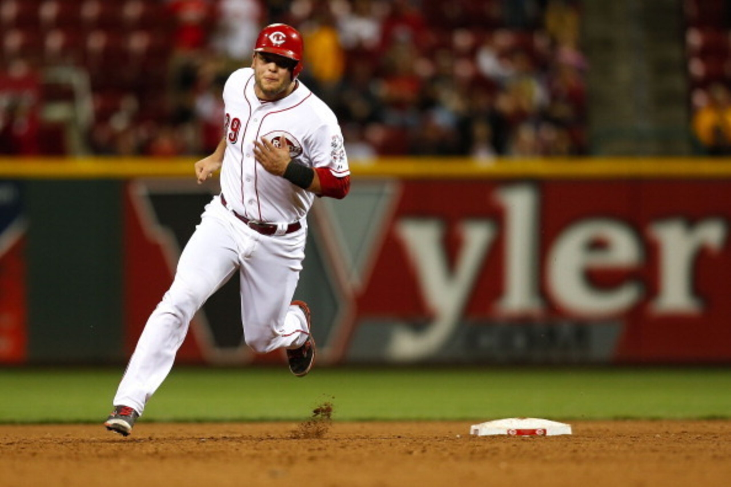 CINCINNATI, OH - SEPTEMBER 23:  Devin Mesoraco #39 of the Cincinnati Reds rounds second base before stopping at third during the 10th inning against the New York Mets at Great American Ball Park on September 23, 2013 in Cincinnati, Ohio. Mesoraco would sc
