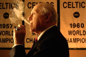 BOSTON - 1996:  Red Auerbacb, vice chairman of the board for the Boston Celtics smokes one of his trademark cigars in a 1996 portrait in Boston, Massachusetts.  NOTE TO USER: User expressly acknowledges and agrees that, by downloading and or using this ph