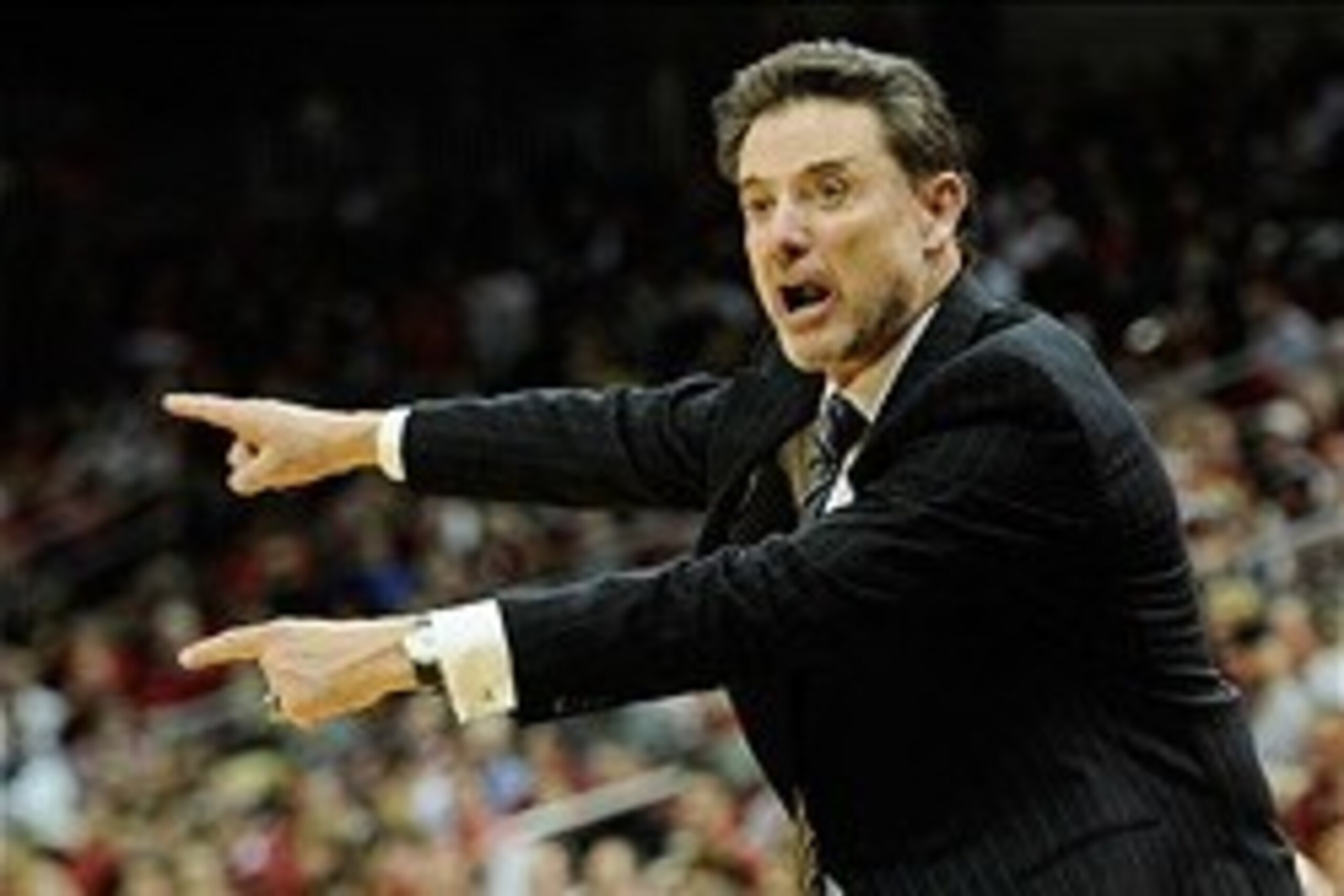 Feb 18, 2014; Louisville, KY, USA; Louisville Cardinals head coach Rick Pitino reacts during the second half against the South Florida Bulls at KFC Yum! Center. Louisville defeated South Florida 80-54.  Mandatory Credit: Jamie Rhodes-USA TODAY Sports