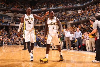 INDIANAPOLIS, IN - MAY 14: Lance Stephenson #1 of the Indiana Pacers reacts to a made basket with Roy Hibbert #55 of the Indiana Pacers against the New York Knicks in Game Four of the Eastern Conference Semifinals during the 2013 NBA Playoffs on May 14, 2