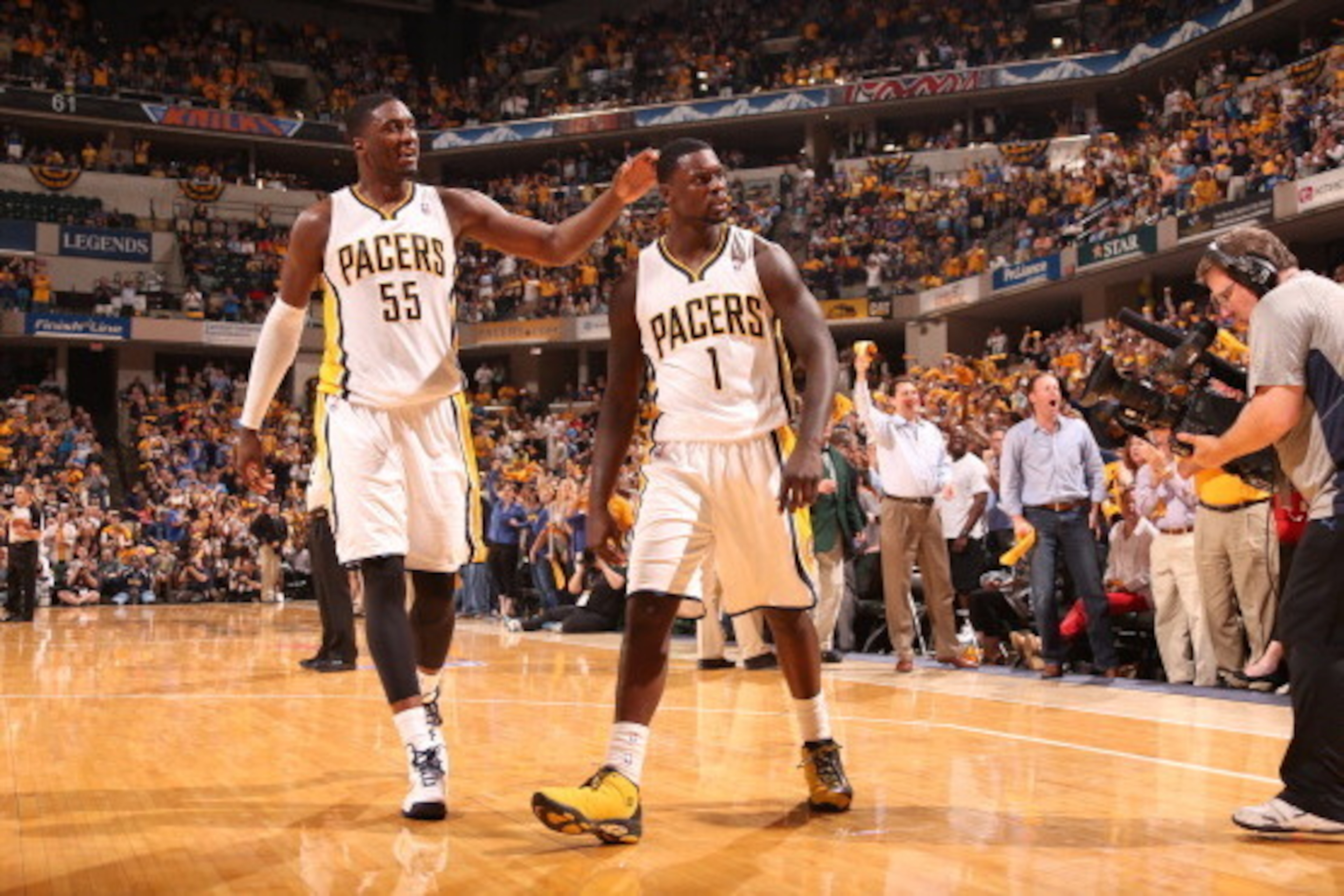 INDIANAPOLIS, IN - MAY 14: Lance Stephenson #1 of the Indiana Pacers reacts to a made basket with Roy Hibbert #55 of the Indiana Pacers against the New York Knicks in Game Four of the Eastern Conference Semifinals during the 2013 NBA Playoffs on May 14, 2