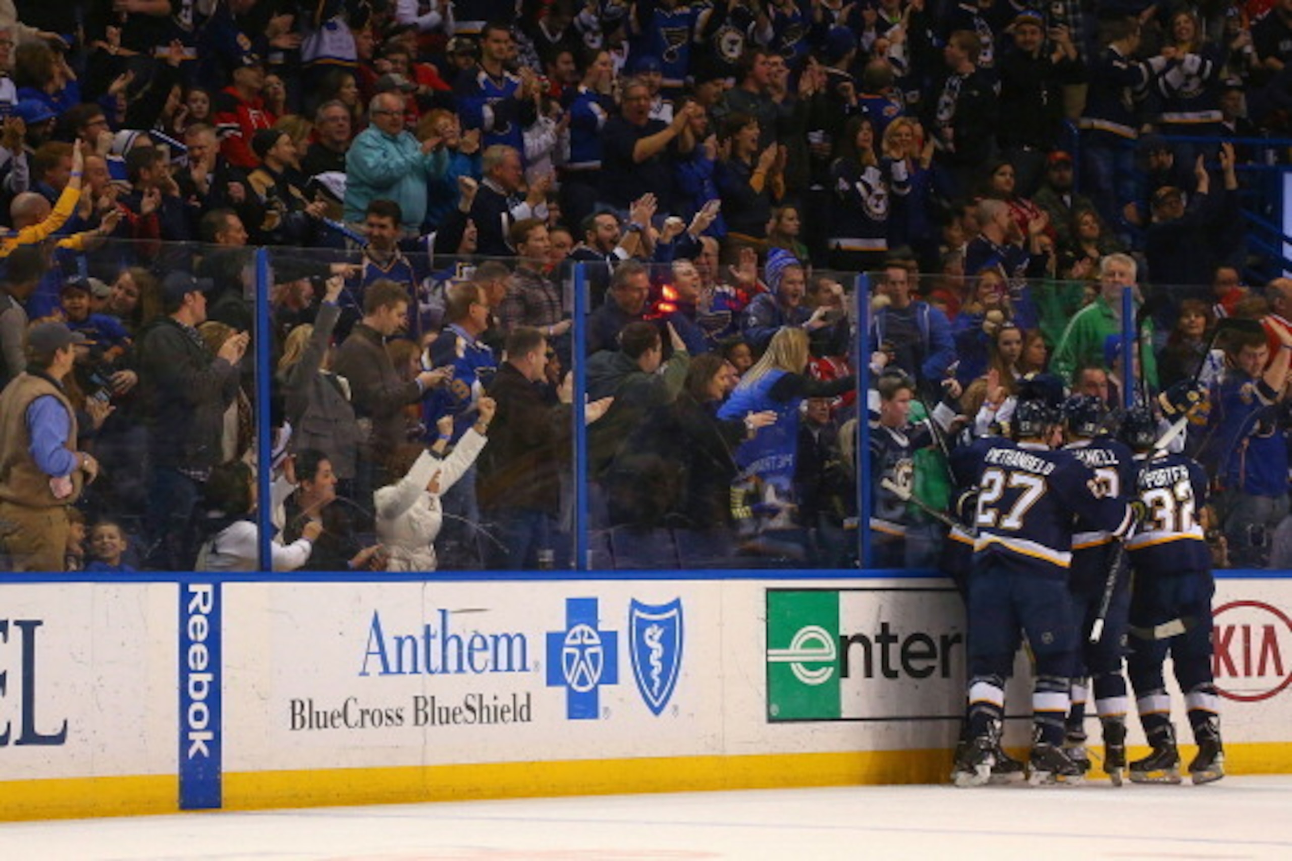 9ST. LOUIS, MO - DECEMBER 28:  Members of the St. Louis Blues celebrate after scoring a goal against the Chicago Blackhawks at the Scottrade Center on December 28, 2013 in St. Louis, Missouri.  (Photo by Dilip Vishwanat/Getty Images)