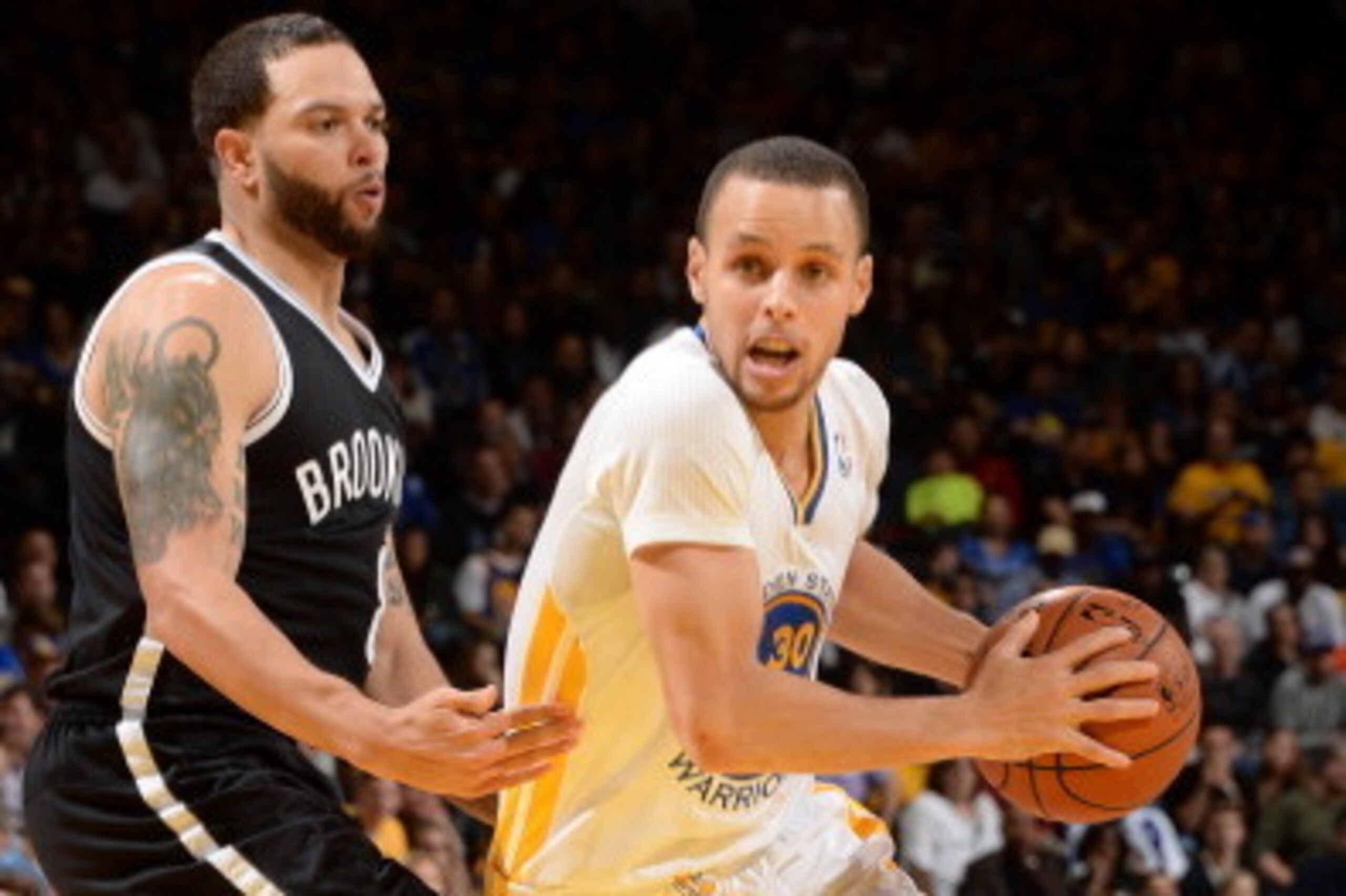 OAKLAND, CA - FEBRUARY 22: Stephen Curry #30 of the Golden State Warriors drives to the basket during a game against the Brooklyn Nets at Oracle Arena on February 22, 2014 in Oakland, California. NOTE TO USER: User expressly acknowledges and agrees that, 