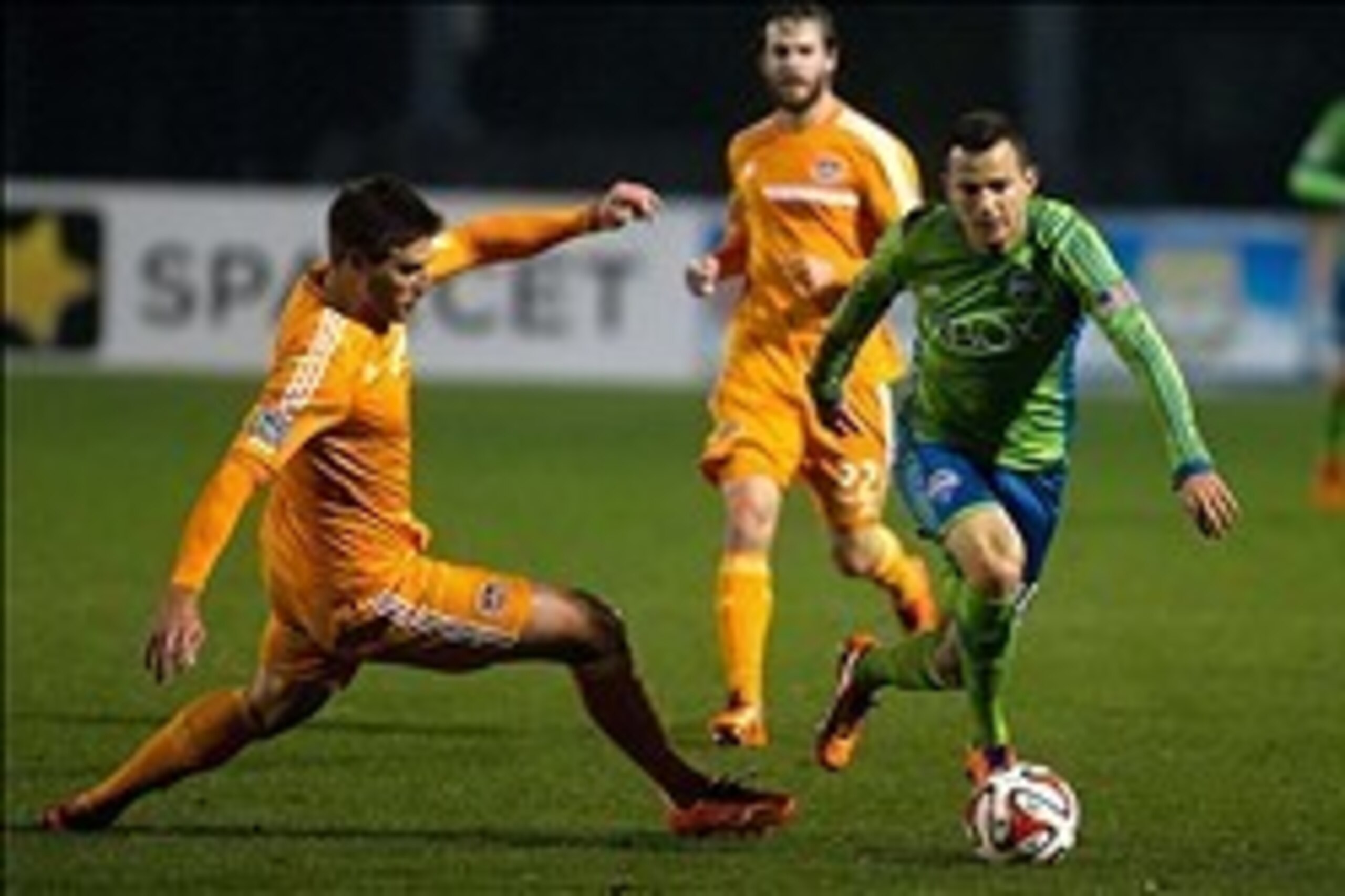 Feb 26, 2014; Charleston, SC, USA; Seattle Sounders FC midfielder Marco Pappa (10) controls the ball during the second half against the Houston Dynamo at Blackbaud Stadium. The Sounders and the Dynamo tied 1-1. Mandatory Credit: Joshua S. Kelly-USA TODAY 
