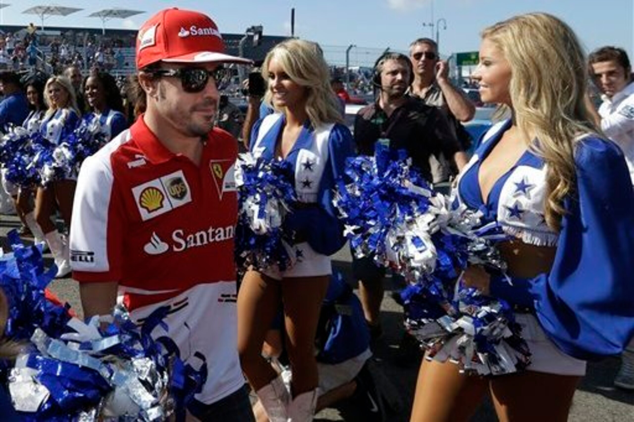 Fernando Alonso and the Dallas Cowboys cheerleaders.