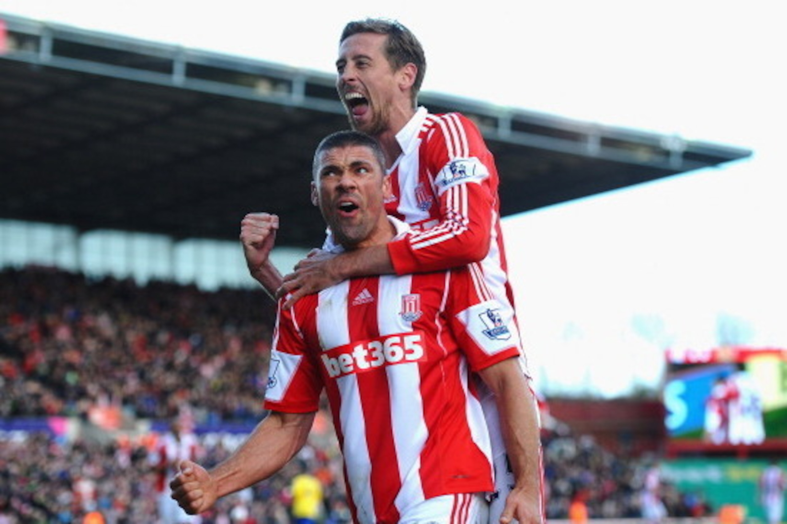 STOKE ON TRENT, ENGLAND - MARCH 01: Jonathan Walters of Stoke City celebrates his goal with Peter Crouch during the Barclays Premier League match between Stoke City and Arsenal at Britannia Stadium on March 1, 2014 in Stoke on Trent, England. (Photo by L STOKE ON TRENT, ENGLAND - MARCH 01: Jonathan Walters of Stoke City celebrates his goal with Peter Crouch during the Barclays Premier League match between Stoke City and Arsenal at Britannia Stadium on March 1, 2014 in Stoke on Trent, England. (Photo by L