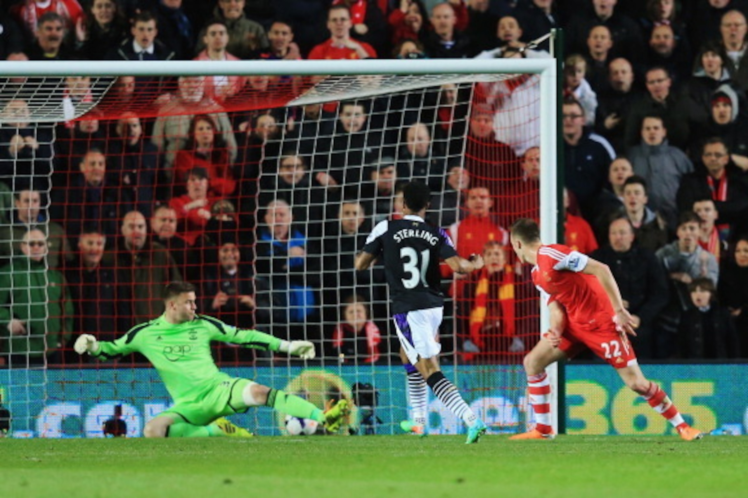 SOUTHAMPTON, ENGLAND - MARCH 01:  Raheem Sterling of Liverpool scores his team's second goal during the Barclays Premier League match between Southampton and Liverpool at St Mary's Stadium on March 1, 2014 in Southampton, England.  (Photo by David Cannon/