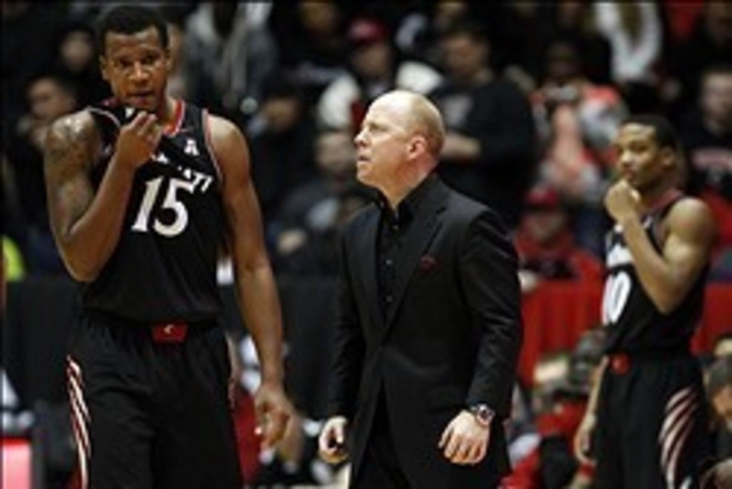 Feb 6, 2014; Cincinnati, OH, USA; Cincinnati Bearcats head coach Mick Cronin talks to forward Jermaine Sanders (15) in the second half against the Connecticut Huskies at FifthThird Arena. Cincinnati defeated UConn 63-58. Mandatory Credit: Frank Victores- Feb 6, 2014; Cincinnati, OH, USA; Cincinnati Bearcats head coach Mick Cronin talks to forward Jermaine Sanders (15) in the second half against the Connecticut Huskies at FifthThird Arena. Cincinnati defeated UConn 63-58. Mandatory Credit: Frank Victores-