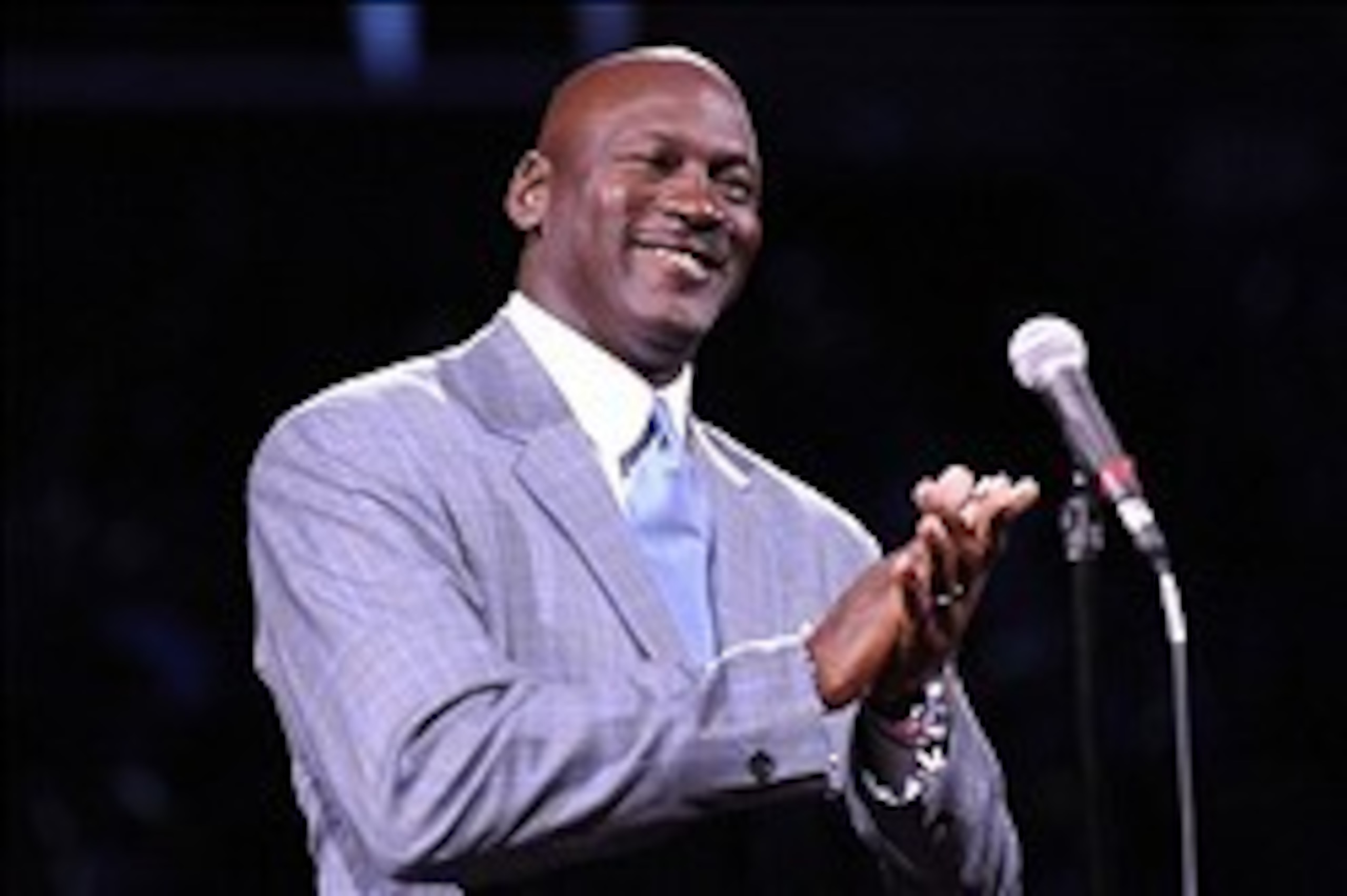Dec 21, 2013; Charlotte, NC, USA; Charlotte Bobcats owner Michael Jordan unveils the new Charlotte Hornets logo at halftime during the game against the Utah Jazz at Time Warner Cable Arena. Mandatory Credit: Sam Sharpe-USA TODAY Sports Dec 21, 2013; Charlotte, NC, USA; Charlotte Bobcats owner Michael Jordan unveils the new Charlotte Hornets logo at halftime during the game against the Utah Jazz at Time Warner Cable Arena. Mandatory Credit: Sam Sharpe-USA TODAY Sports