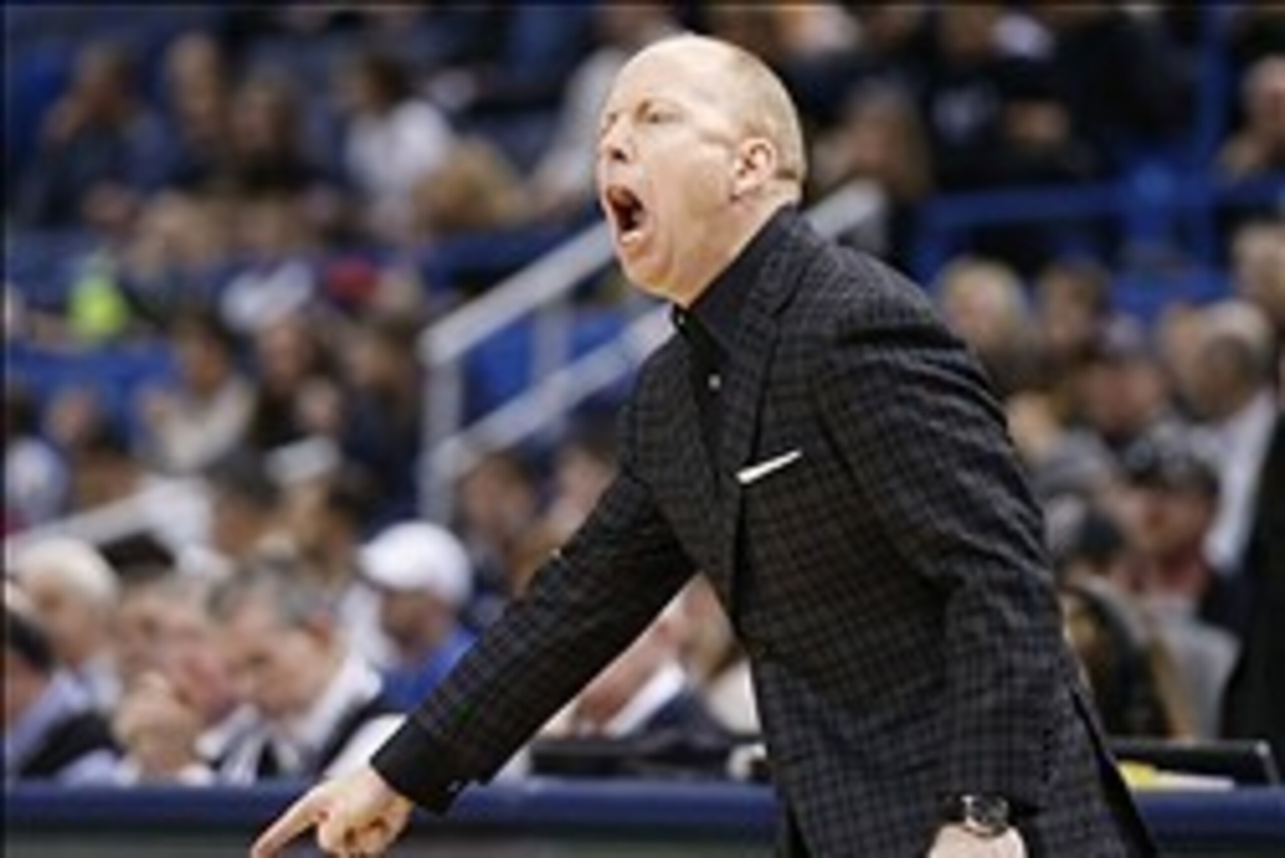 Mar 1, 2014; Hartford, CT, USA; Cincinnati Bearcats head coach Mick Cronin watches from the sideline as they take on the Connecticut Huskies in the first half at XL Center. Mandatory Credit: David Butler II-USA TODAY Sports Mar 1, 2014; Hartford, CT, USA; Cincinnati Bearcats head coach Mick Cronin watches from the sideline as they take on the Connecticut Huskies in the first half at XL Center. Mandatory Credit: David Butler II-USA TODAY Sports