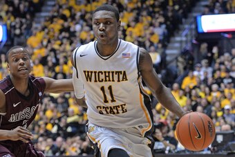 WICHITA, KS - MARCH 01:  Forward Cleanthony Early #11 of the Wichita State Shockers drives to the basket against the Missouri State Bears during the first half on March 1, 2014 at Charles Koch Arena in Wichita, Kansas.  (Photo by Peter Aiken/Getty Images)