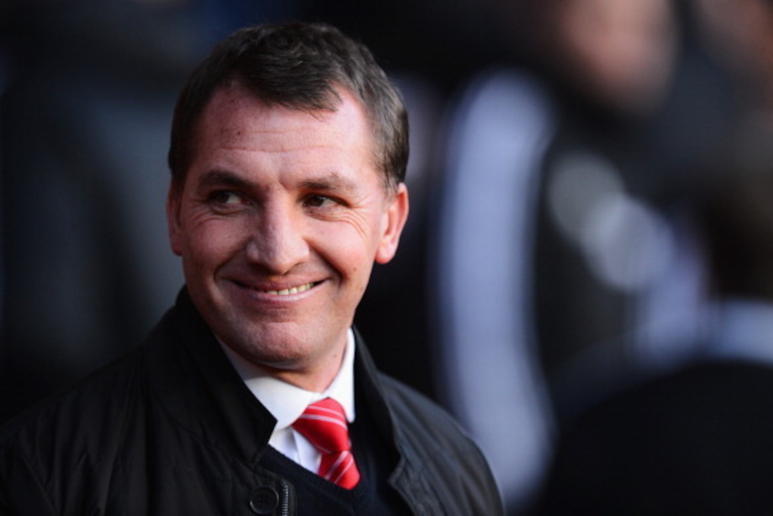 SOUTHAMPTON, ENGLAND - MARCH 01: Brendan Rodgers, manager of Liverpool smiles during the Barclays Premier League match between Southampton and Liverpool at St Mary's Stadium on March 1, 2014 in Southampton, England.  (Photo by Mike Hewitt/Getty Images)