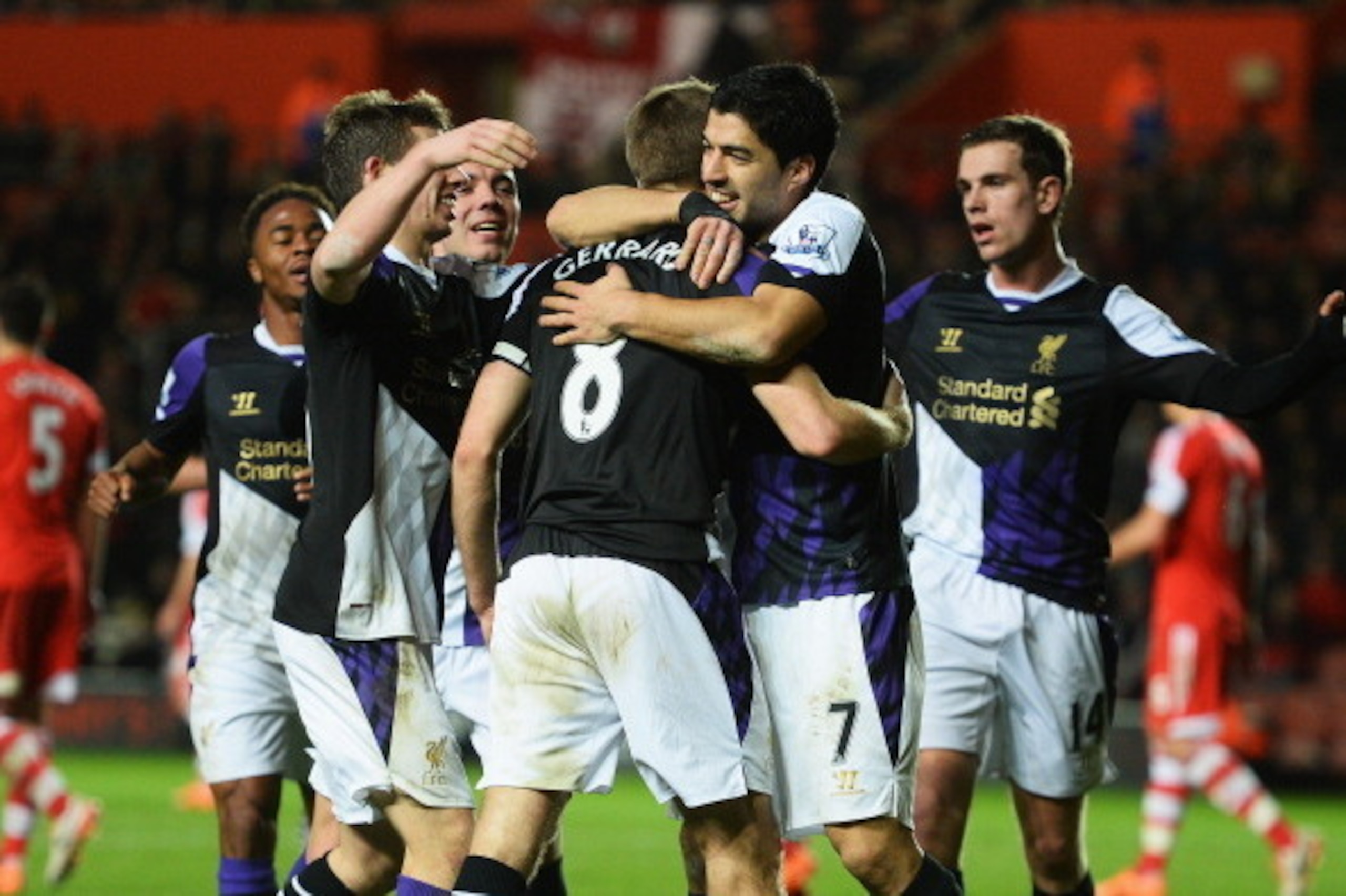 SOUTHAMPTON, ENGLAND - MARCH 01:  Luis Suarez of Liverpool celebrates Steven Gerrard's penalty during the Barclays Premier League match between Southampton and Liverpool at St Mary's Stadium on March 1, 2014 in Southampton, England.  (Photo by Mike Hewitt