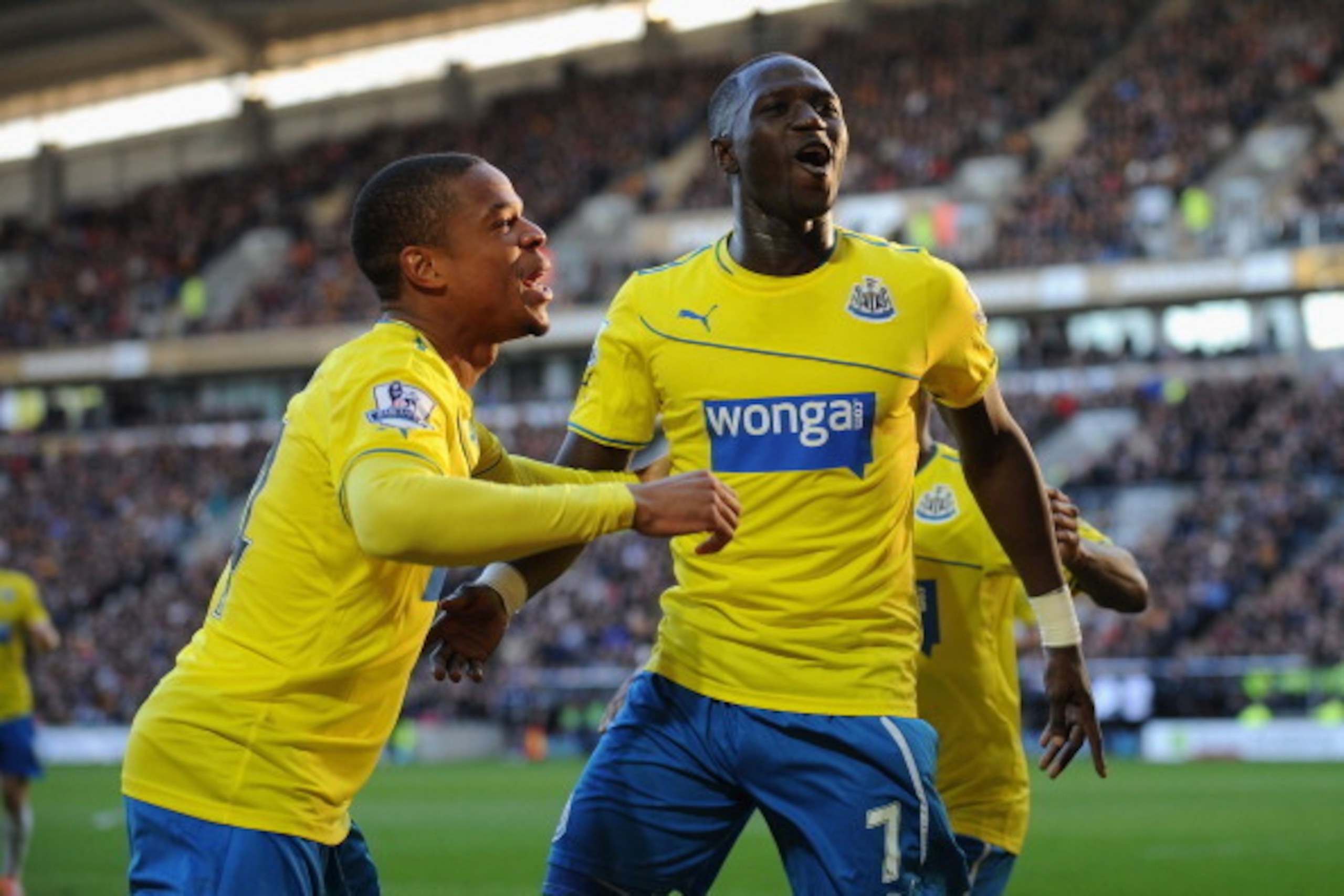 HULL, ENGLAND - MARCH 01: Moussa Sissoko (R) of Newcastle United celebrates with Loic Remy after scoring their third goal during the Barclays Premier League match between Hull City and Newcastle United at KC Stadium on March 1, 2014 in Hull, England. (P HULL, ENGLAND - MARCH 01: Moussa Sissoko (R) of Newcastle United celebrates with Loic Remy after scoring their third goal during the Barclays Premier League match between Hull City and Newcastle United at KC Stadium on March 1, 2014 in Hull, England. (P