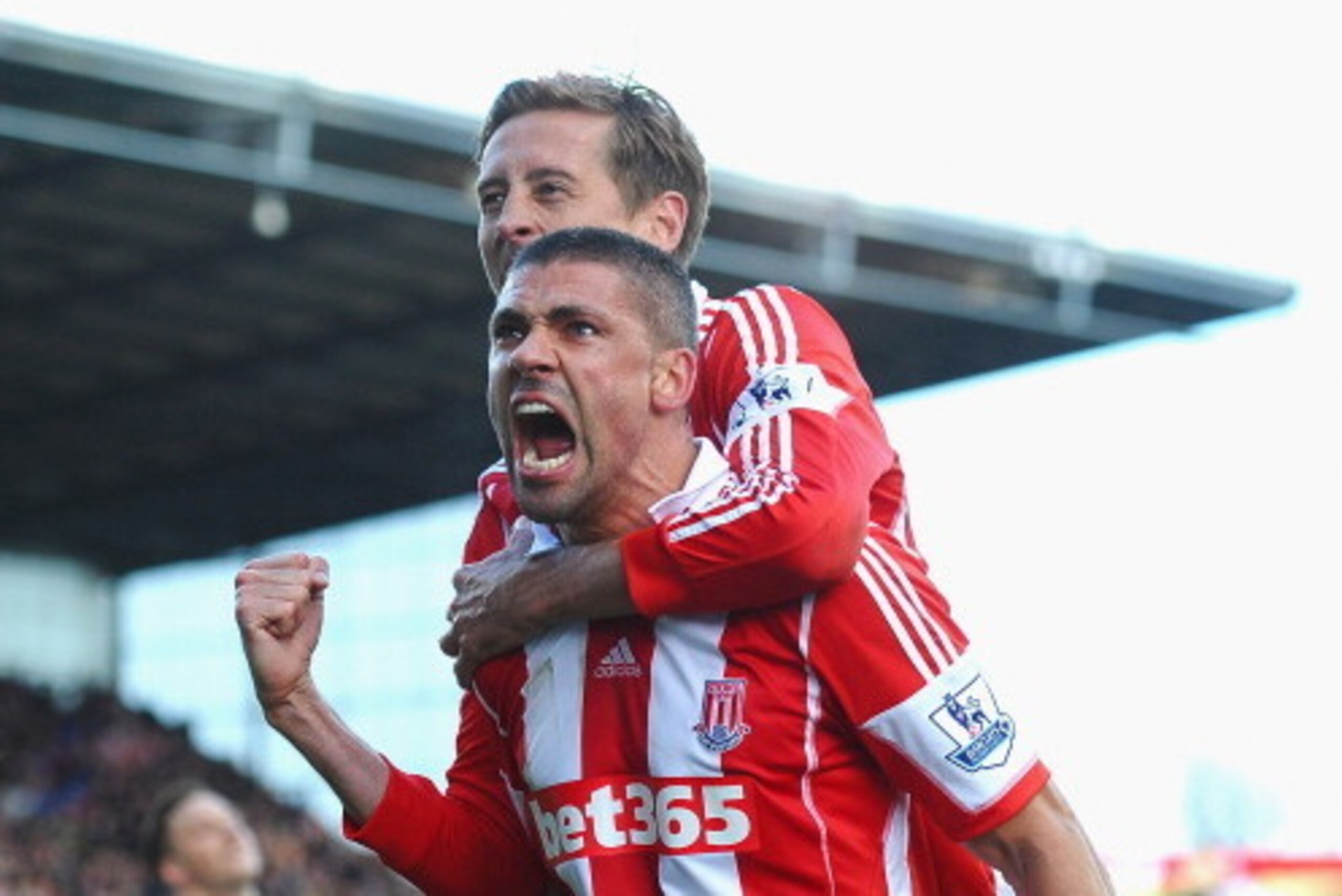 STOKE ON TRENT, ENGLAND - MARCH 01: Jonathan Walters of Stoke City celebrates his goal with Peter Crouch during the Barclays Premier League match between Stoke City and Arsenal at Britannia Stadium on March 1, 2014 in Stoke on Trent, England. (Photo by L STOKE ON TRENT, ENGLAND - MARCH 01: Jonathan Walters of Stoke City celebrates his goal with Peter Crouch during the Barclays Premier League match between Stoke City and Arsenal at Britannia Stadium on March 1, 2014 in Stoke on Trent, England. (Photo by L