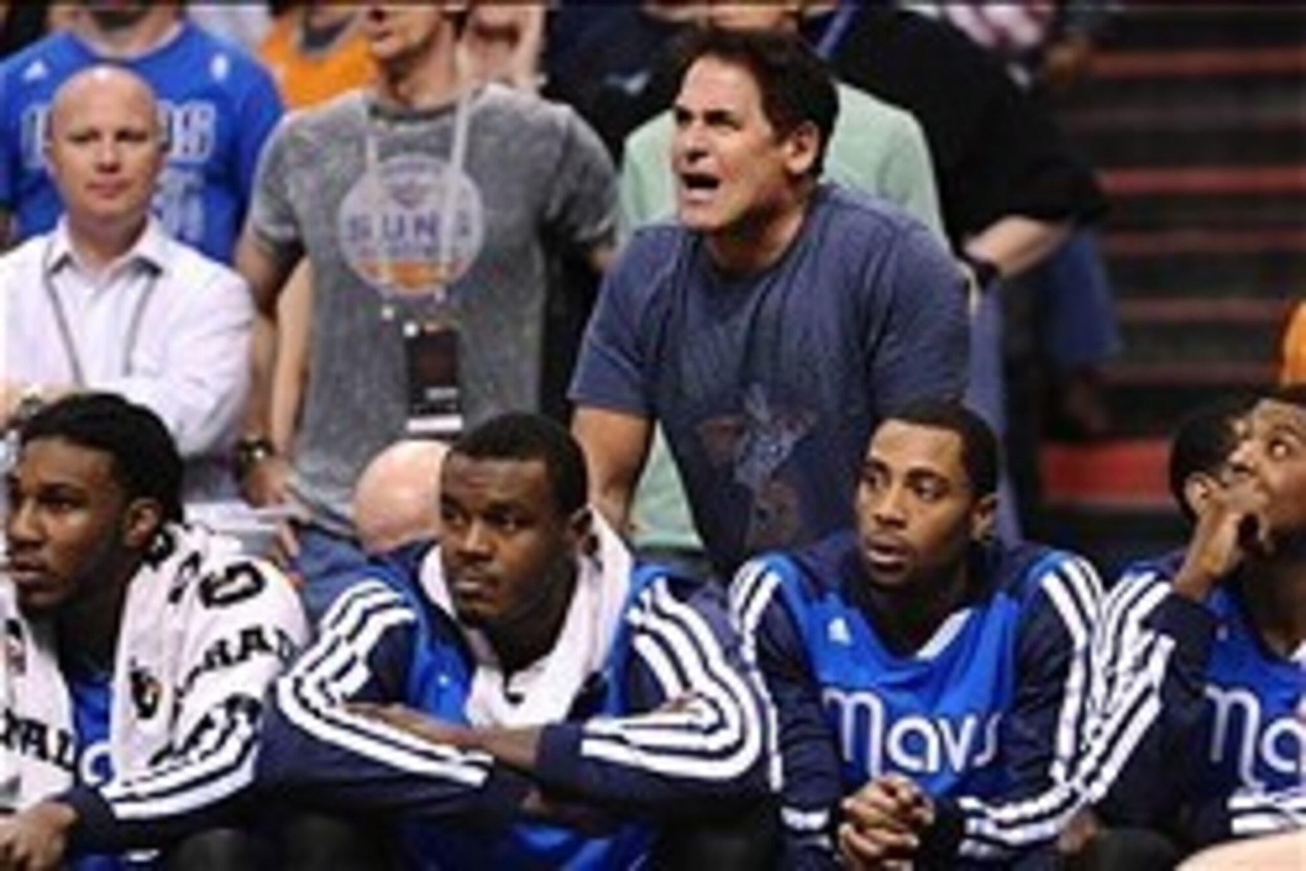 Jan 17, 2014; Phoenix, AZ, USA; Dallas Mavericks owner Mark Cuban yells from the bench in the second half against the Phoenix Suns at US Airways Center. The Mavericks won 110-107. Mandatory Credit: Jennifer Stewart-USA TODAY Sports