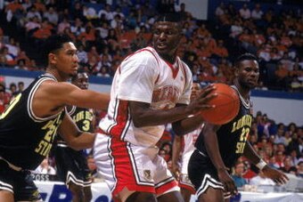 MARCH - 1991:  Larry Johnson #4 of the University of Las Vegas Nevada Rebels looks to make a move during an NCAA game against Cal State Long Beach in March of 1991.  (Photo by Ken Levine/Getty Images)