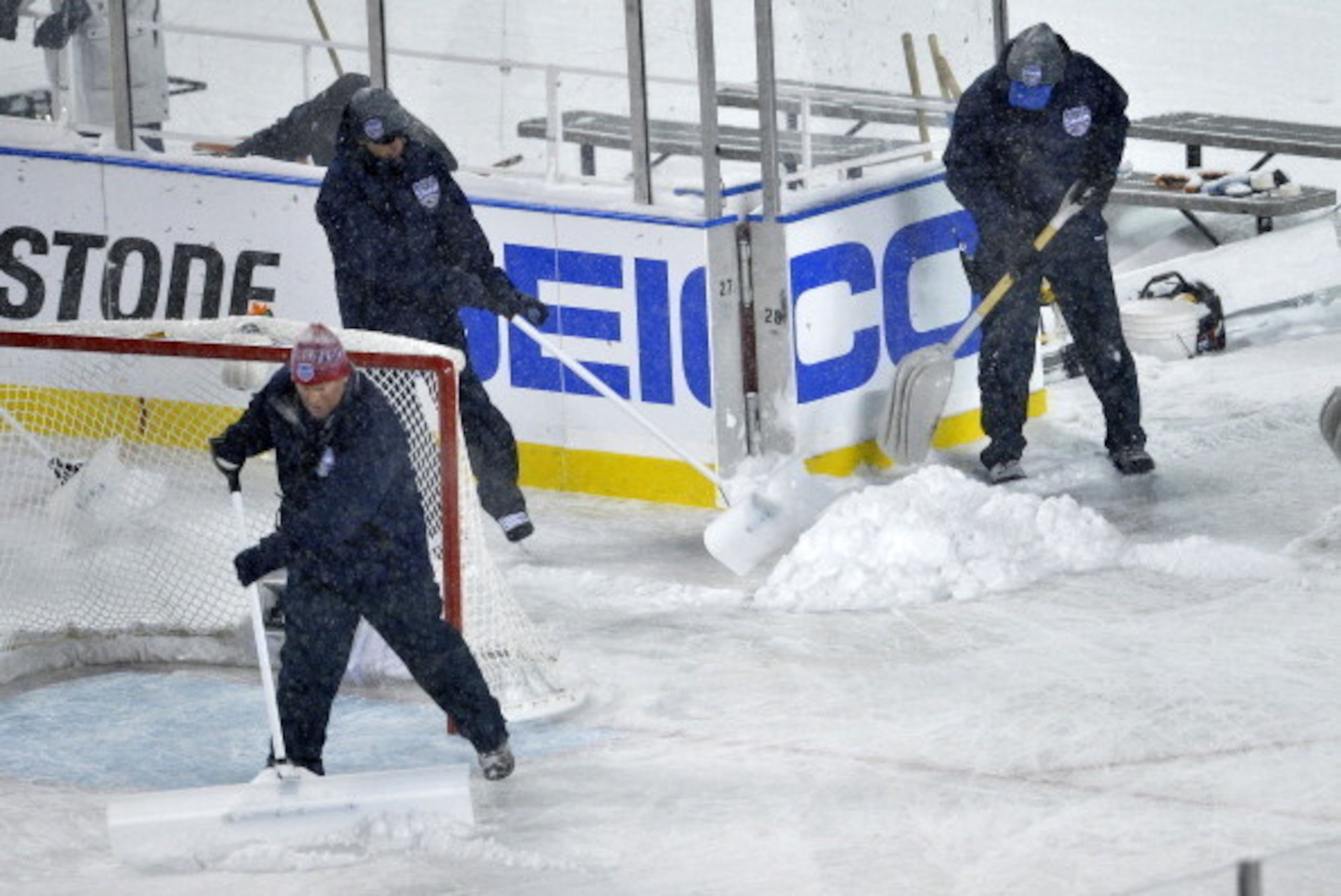 CHICAGO, IL - MARCH 1: (EDITORIAL USE ONLY) Crews clear snow from the ice during the first period of the 2014 Coors Light NHL Stadium Series game between the Chicago Blackhawks and the Pittsburgh Penguins at Soldier Field on March 1, 2014 in Chicago, Ill CHICAGO, IL - MARCH 1: (EDITORIAL USE ONLY) Crews clear snow from the ice during the first period of the 2014 Coors Light NHL Stadium Series game between the Chicago Blackhawks and the Pittsburgh Penguins at Soldier Field on March 1, 2014 in Chicago, Ill