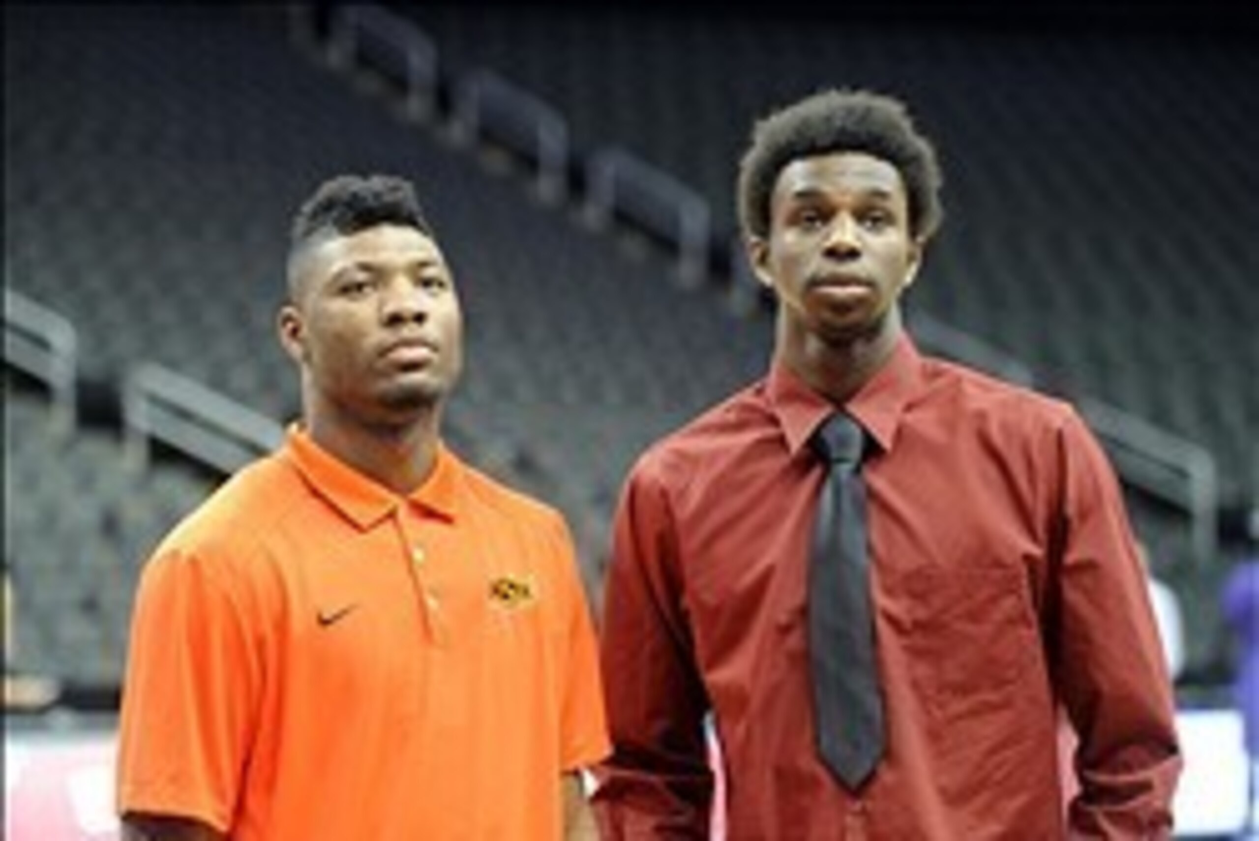 Oct 22, 2013; Kansas City, MO, USA; Oklahoma State guard Marcus Smart and Kanas guard Andrew Wiggins pose for a photo during the Big 12 media day at Sprint Center. Mandatory Credit: Denny Medley-USA TODAY Sports