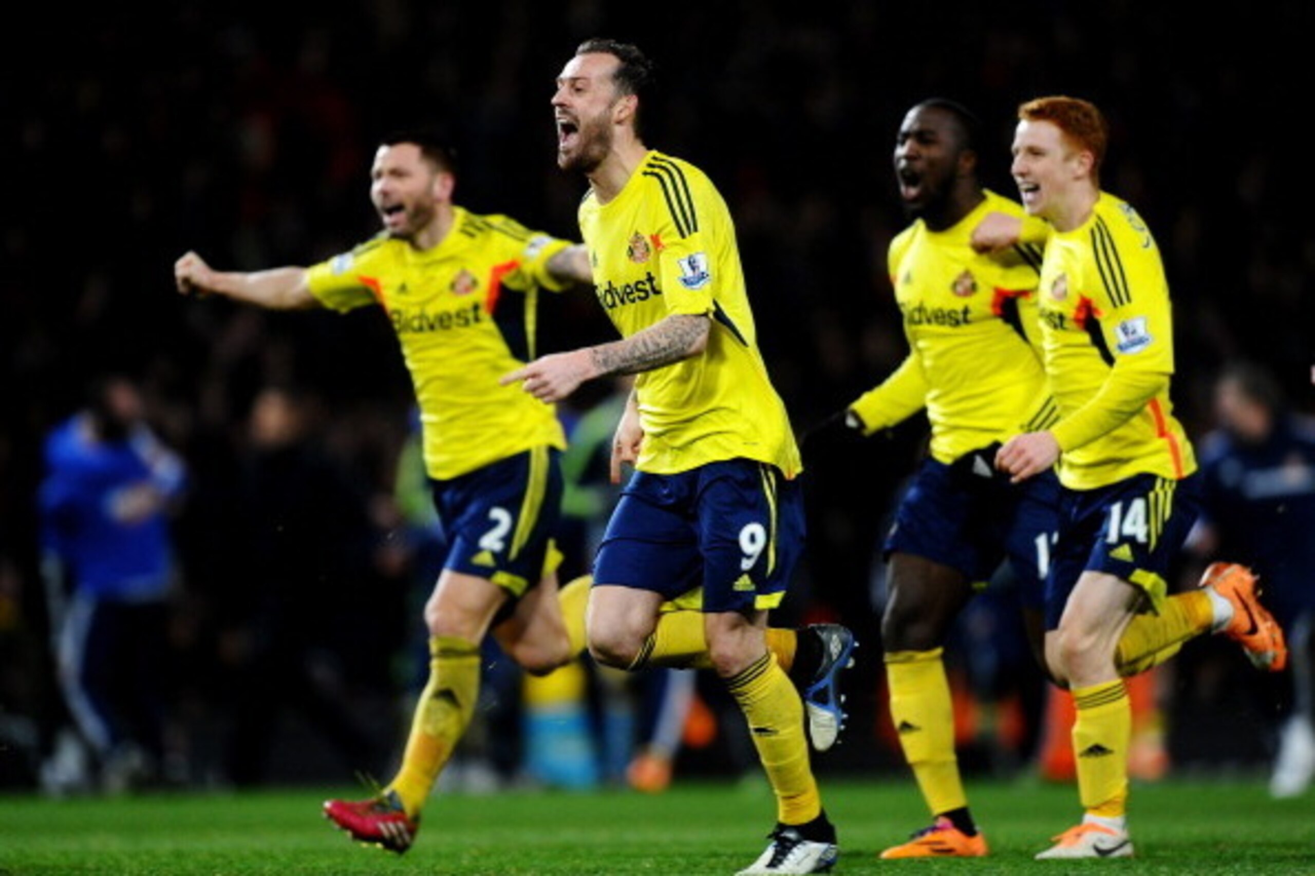 MANCHESTER, ENGLAND - JANUARY 22:  Steven Fletcher of Sunderland and his teammates celebrate their team's 2-1 victory in the penalty shootout during the Capital One Cup semi final, second leg match between Manchester United and Sunderland at Old Trafford 