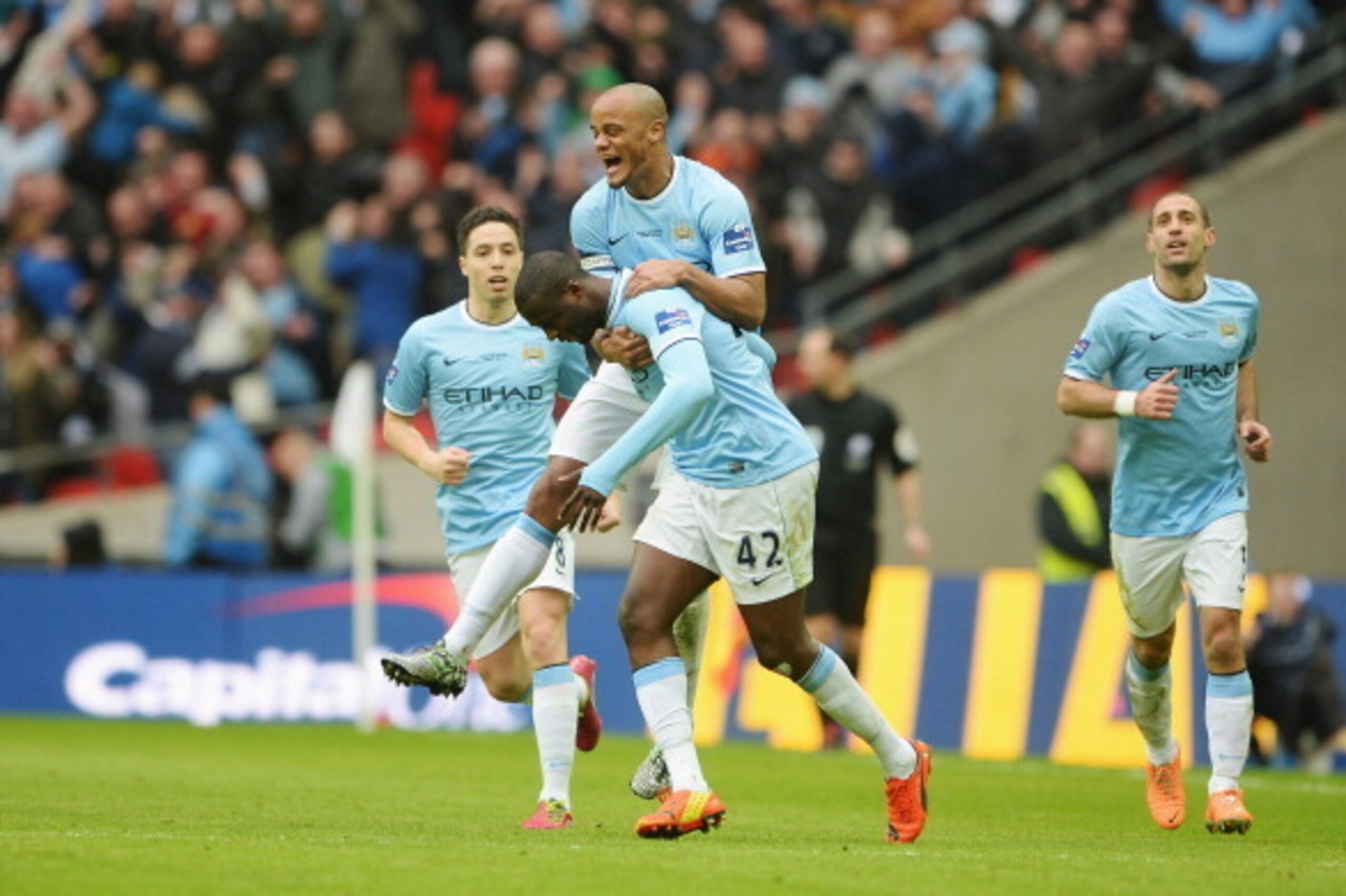 LONDON, ENGLAND - MARCH 02: Yaya Toure of Manchester City celebrates his goal with Vincent Kompany of Manchester City during the Capital One Cup Final between Manchester City and Sunderland at Wembley Stadium on March 2, 2014 in London, England. (Photo LONDON, ENGLAND - MARCH 02: Yaya Toure of Manchester City celebrates his goal with Vincent Kompany of Manchester City during the Capital One Cup Final between Manchester City and Sunderland at Wembley Stadium on March 2, 2014 in London, England. (Photo