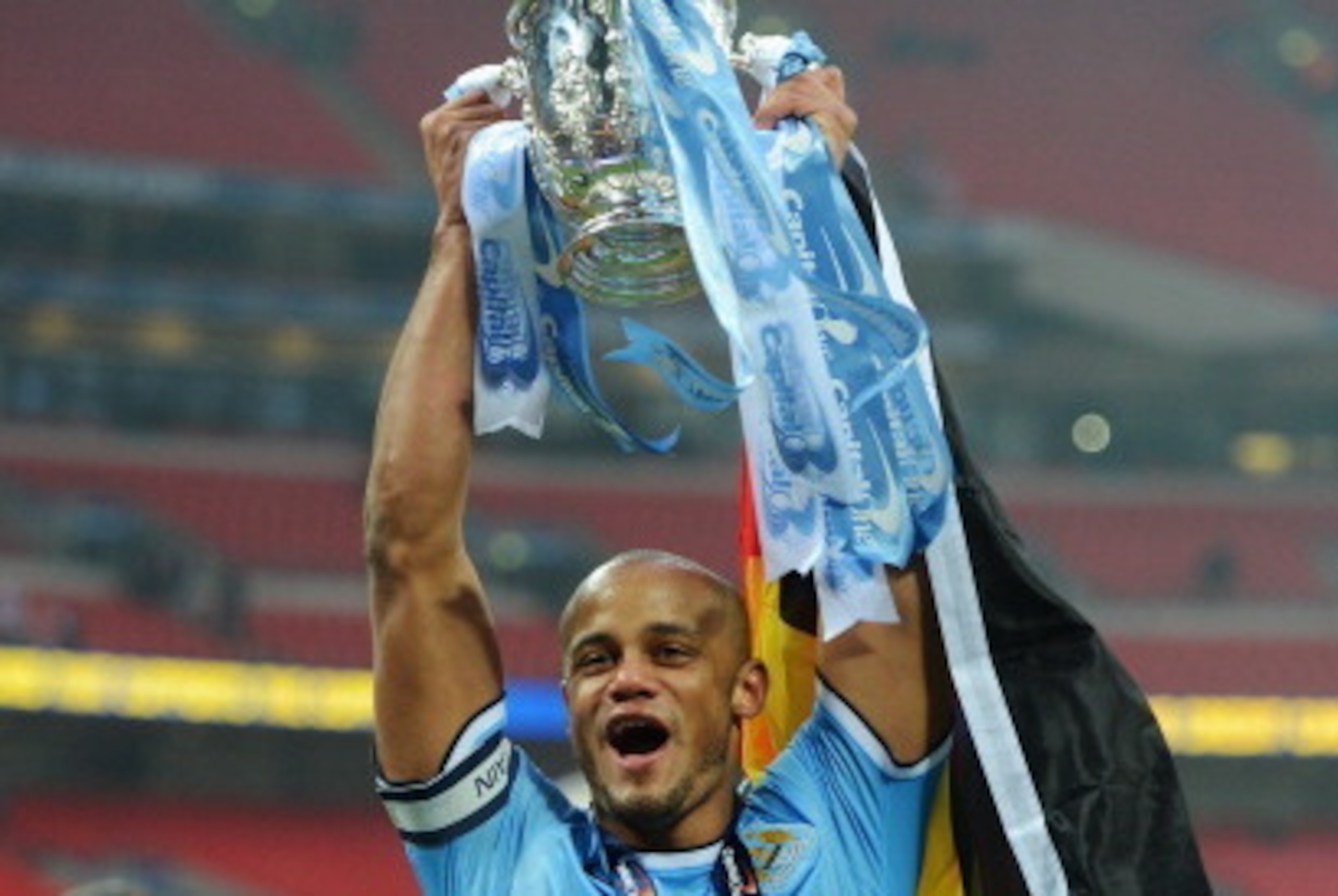 LONDON, ENGLAND - MARCH 02: Vincent Kompany of Manchester City celebrates with the trophy after the Capital One Cup Final between Manchester City and Sunderland at Wembley Stadium on March 2, 2014 in London, England. (Photo by Michael Regan/Getty Images) LONDON, ENGLAND - MARCH 02: Vincent Kompany of Manchester City celebrates with the trophy after the Capital One Cup Final between Manchester City and Sunderland at Wembley Stadium on March 2, 2014 in London, England. (Photo by Michael Regan/Getty Images)