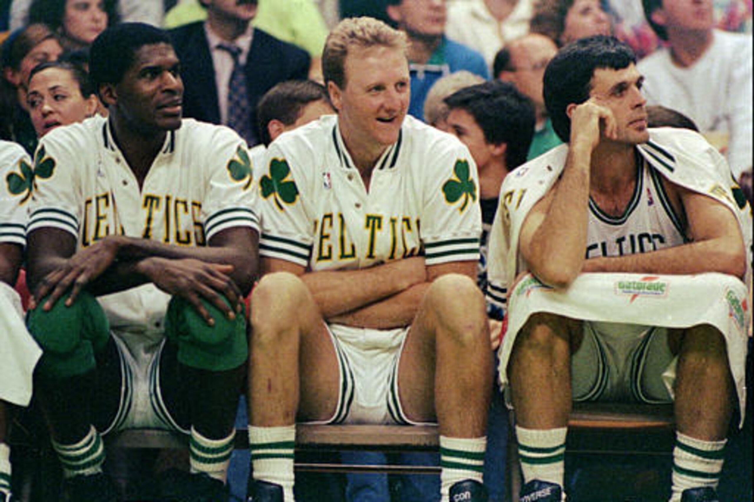 McHale with fellow Celtics greats Robert Parish and Larry Bird.