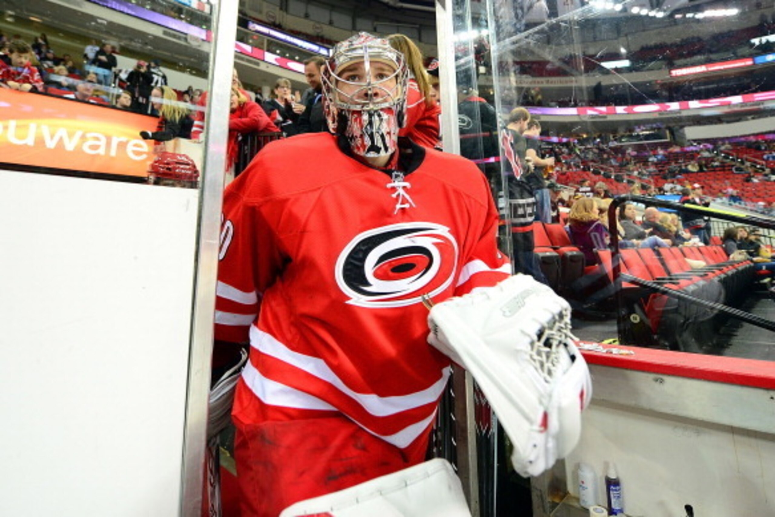 RALEIGH, NC - DECEMBER 27: Cam Ward #30 of the Carolina Hurricanes comes out of the locker room during an NHL game against the Pittsburgh Penguins on December 27, 2013 at PNC Arena in Raleigh, North Carolina.  (Photo by Phil Ellsworth/NHLI via Getty Image