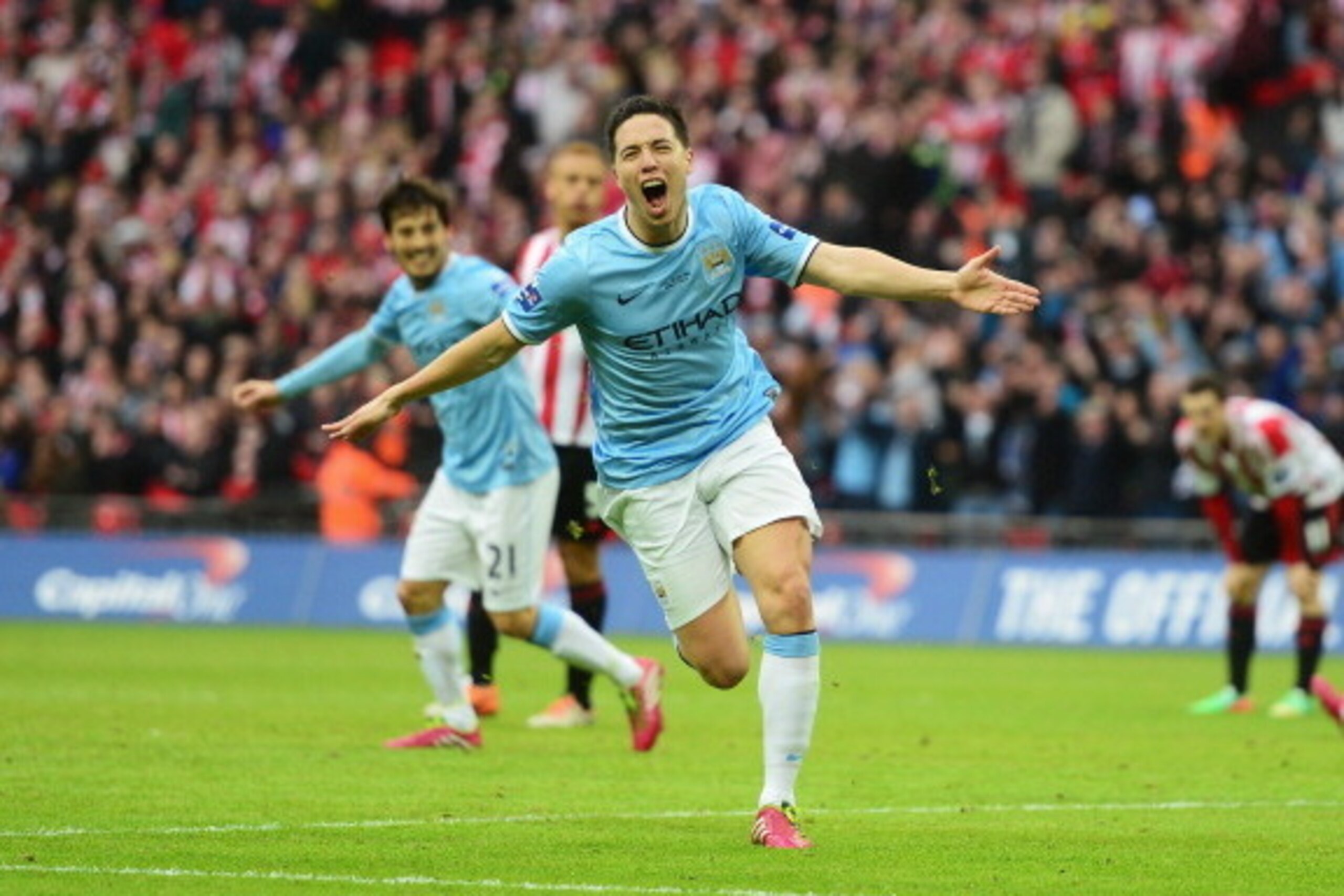 LONDON, ENGLAND - MARCH 02:  Samir Nasri of Manchester City celebrates his goal during the Capital One Cup Final between Manchester City and Sunderland at Wembley Stadium on March 2, 2014 in London, England.  (Photo by Jamie McDonald/Getty Images)