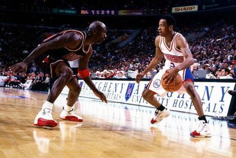 PHILADELPHIA - 1997:  Allen Iverson #3 of the Philadelphia 76ers faces off at the perimeter against Michael Jordan #23 of the Chicago Bulls at the First Union Center during the 1997 NBA season in Philadelphia, Pennsylvania.  NOTE TO USER: User expressly a