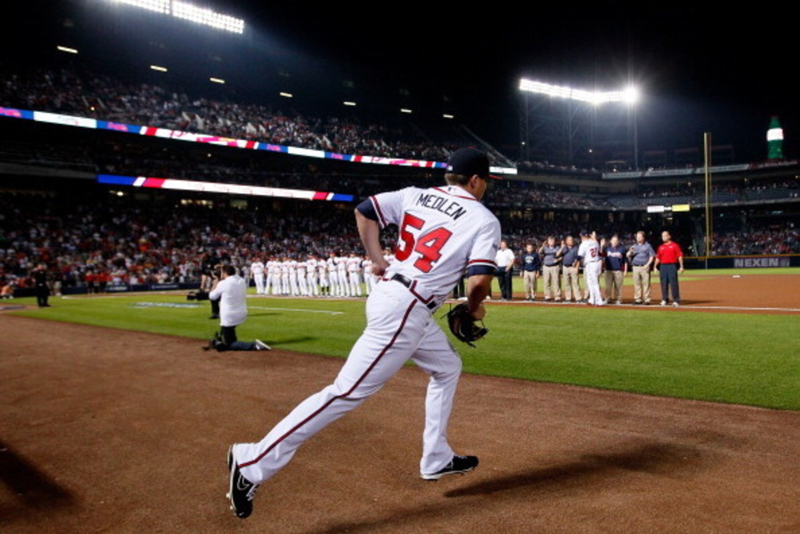 ATLANTA, GA - OCTOBER 03: Kris Medlen #54 of the Atlanta Braves takes the field against the Los Angeles Dodgers prior to Game One of the National League Division Series at Turner Field on October 3, 2013 in Atlanta, Georgia.  (Photo by Kevin C. Cox/Getty 