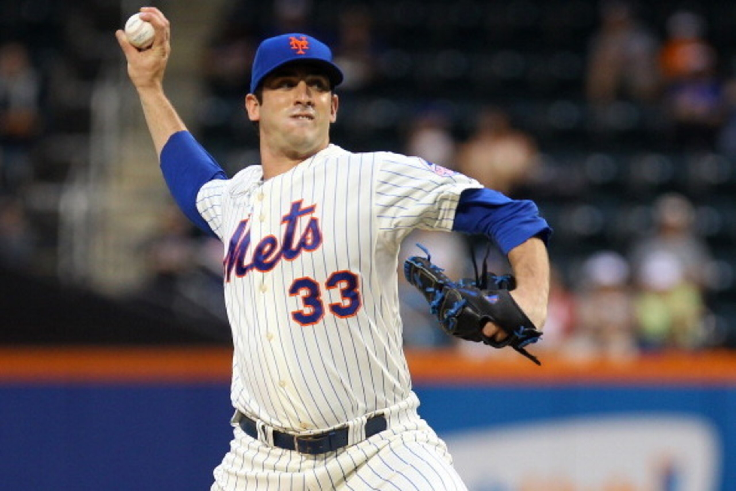 NEW YORK, NY - AUGUST 07: Matt Harvey #33 of the New York Mets  pitches in the first inning against the Colorado Rockies at Citi Field on August 7, 2013 at Citi Field in the Flushing neighborhood of the Queens borough of New York City.  (Photo by Mike Sto