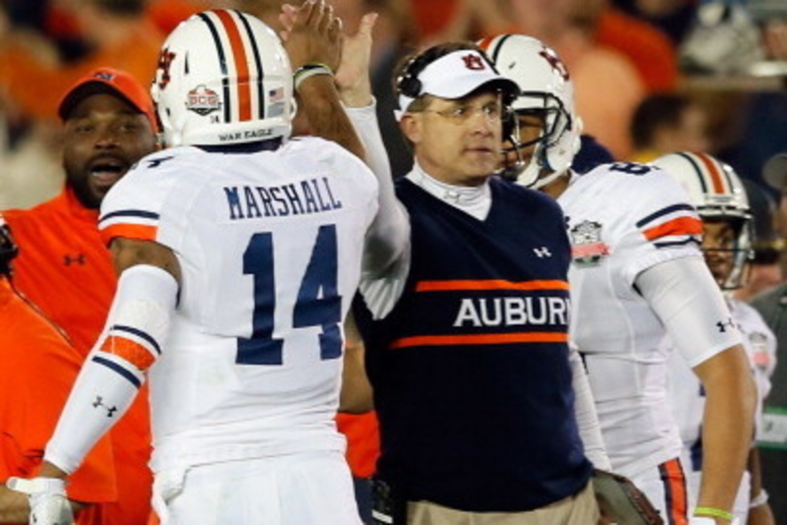 PASADENA, CA - JANUARY 06: Quarterback Nick Marshall #14 and head coach Gus Malzahn celebrate after a touchdown against the Florida State Seminoles in the second quarter of the 2014 Vizio BCS National Championship Game at the Rose Bowl on January 6, 2014 PASADENA, CA - JANUARY 06: Quarterback Nick Marshall #14 and head coach Gus Malzahn celebrate after a touchdown against the Florida State Seminoles in the second quarter of the 2014 Vizio BCS National Championship Game at the Rose Bowl on January 6, 2014