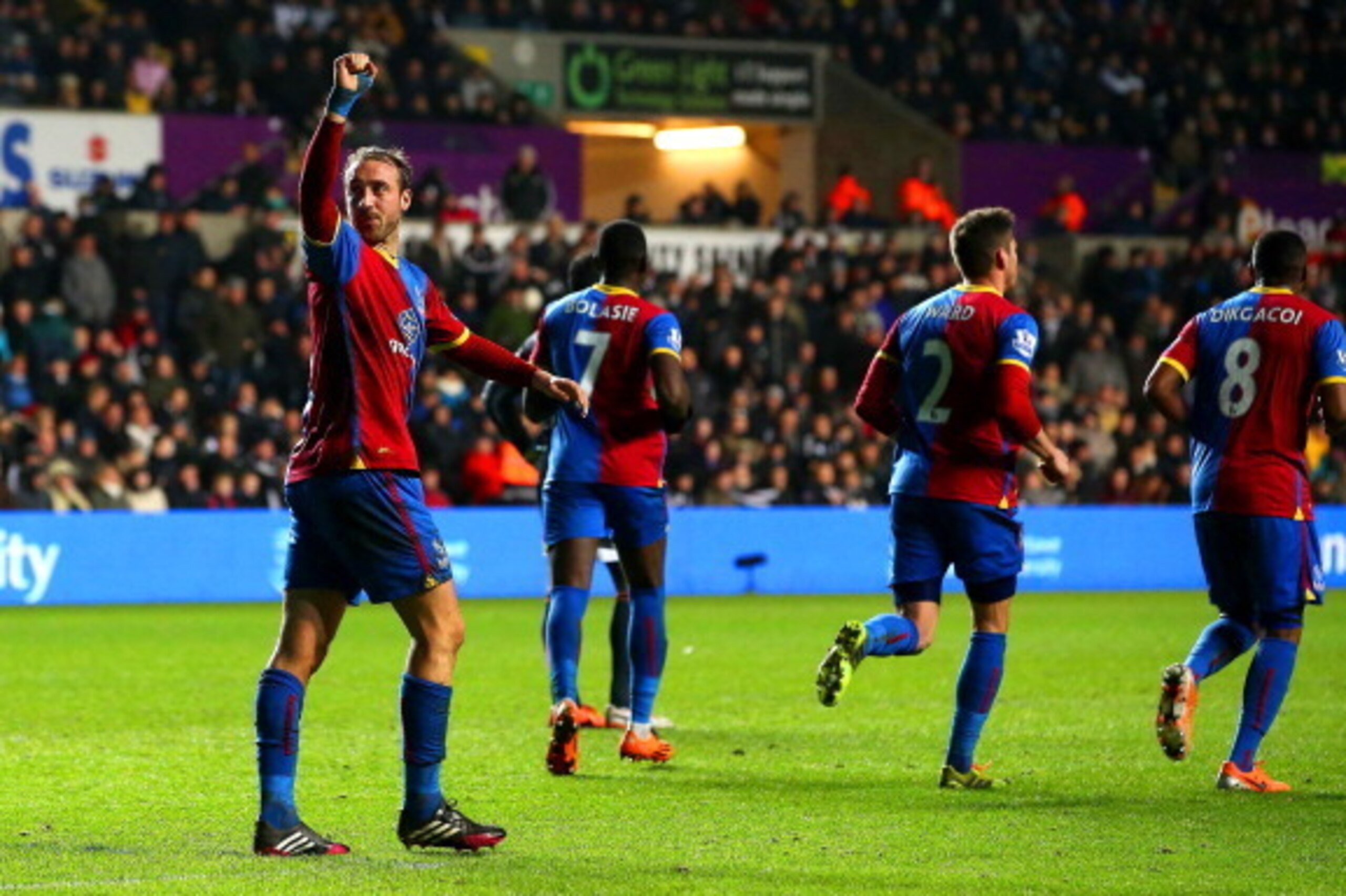 SWANSEA, WALES - MARCH 02:  Glenn Murray of Crystal Palace celebrates scoring the equalising goal from the penalty spot during the Barclays Premier League match between Swansea City and Crystal Palace at Liberty Stadium on March 2, 2014 in Swansea, Wales.