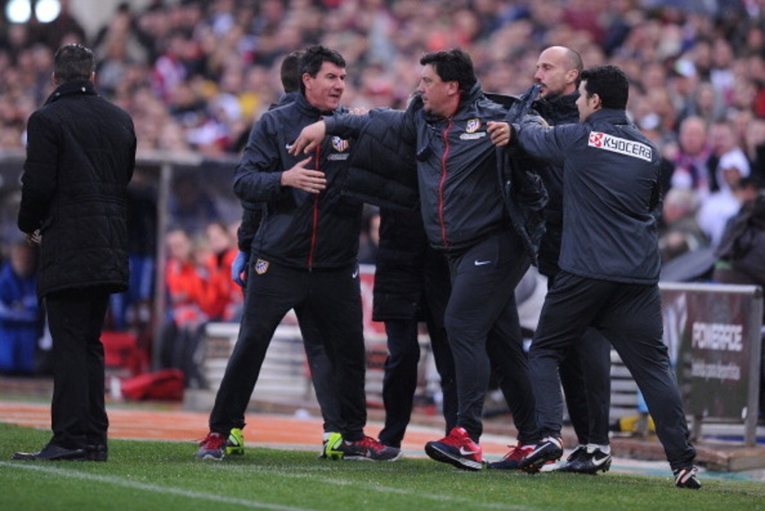 MADRID, SPAIN - MARCH 02:  Club Atletico De Madrid assistant coach German 'Mono' Burgos (C) reacts during the La Liga match between Club Atletico de Madrid and Real Madrid CF  at Vicente Calderon Stadium on March 2, 2014 in Madrid, Spain.  (Photo by Denis