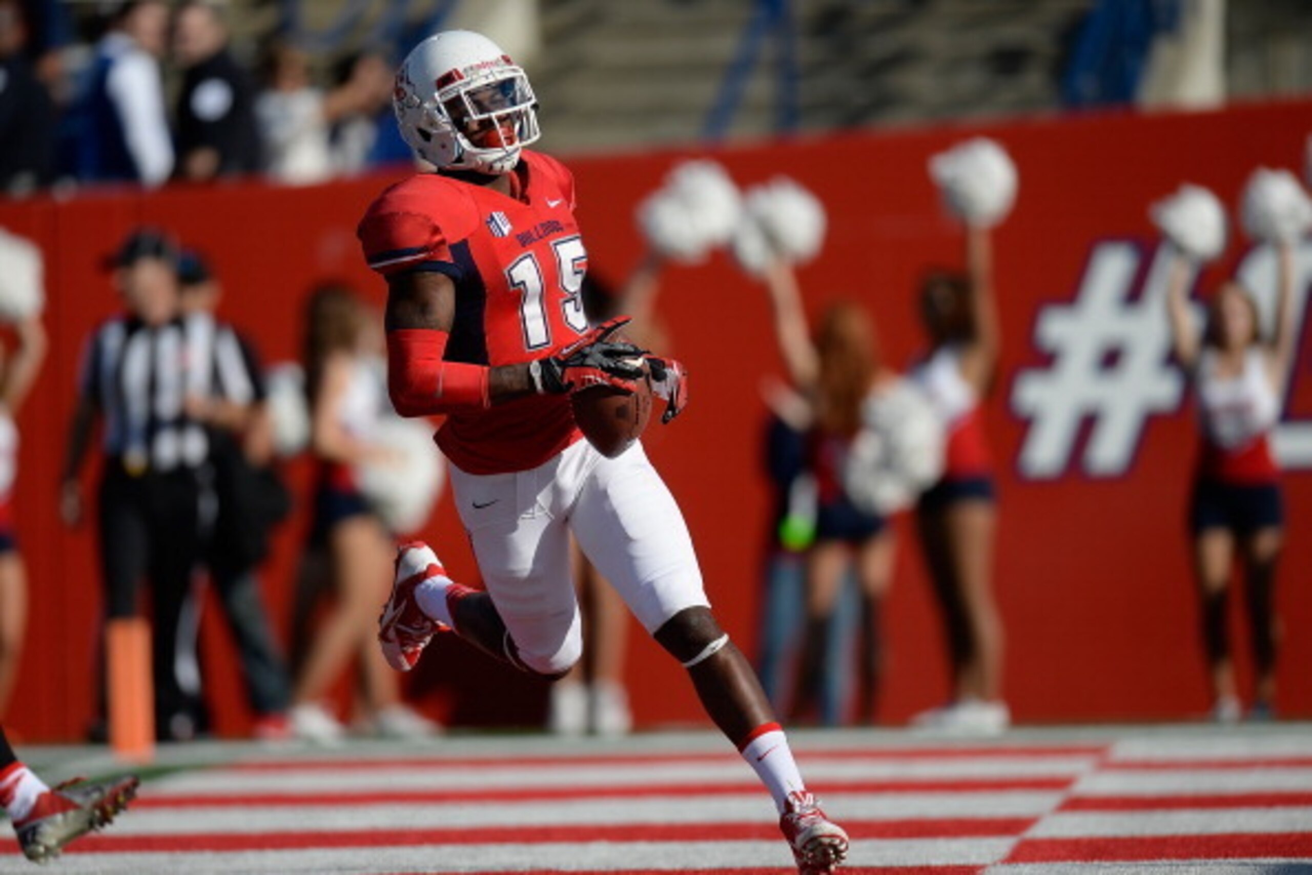 FRESNO, CA - NOVEMBER 23:  Davante Adams #15 of the Fresno State Bulldogs scores on a forty four yard pass play against the New Mexico Lobos during the second quarter at Bulldog Stadium on November 23, 2013 in Fresno, California.  (Photo by Thearon W. Hen